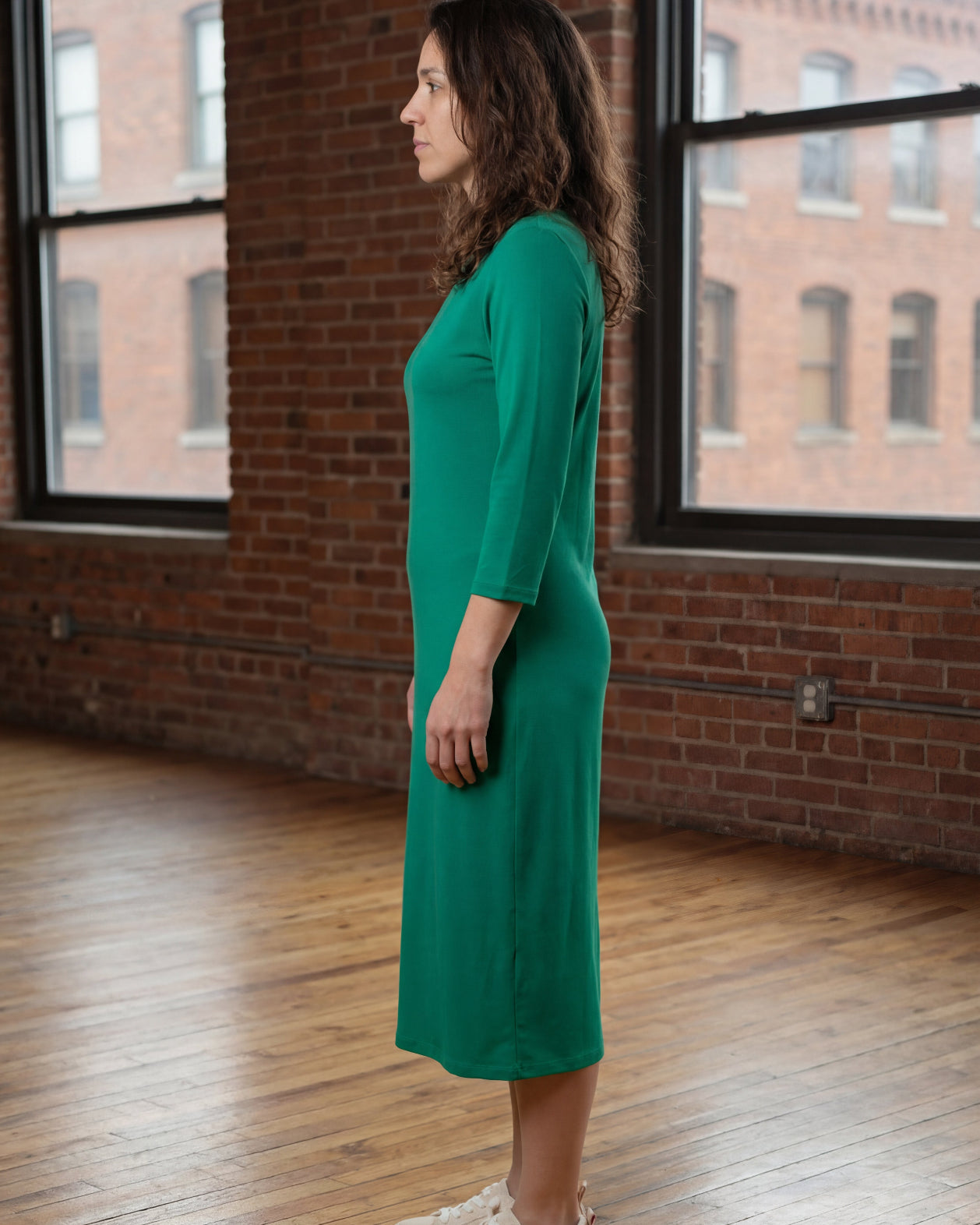 Model wearing Nuggles® Midi Layering Dress in Kelly Green