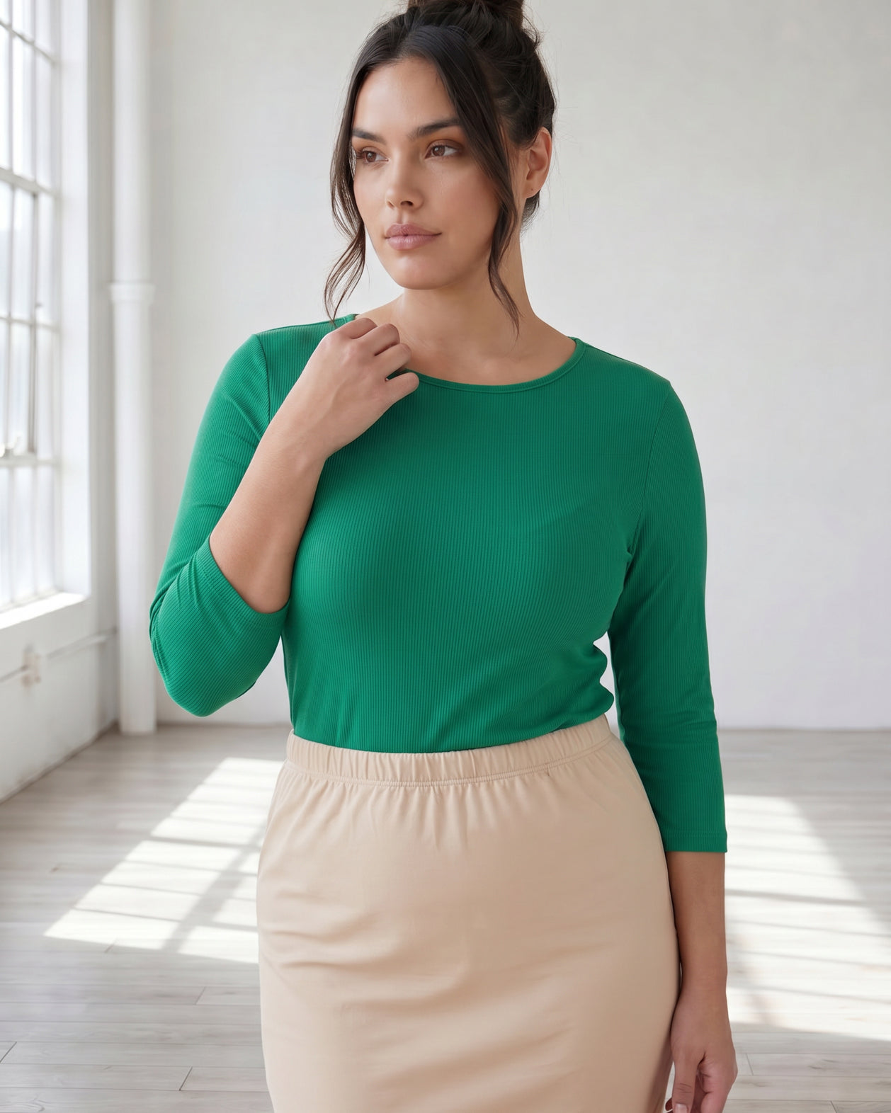 Model wearing Nuggles® 3/4 Essential Ribbed Tee in Kelly Green