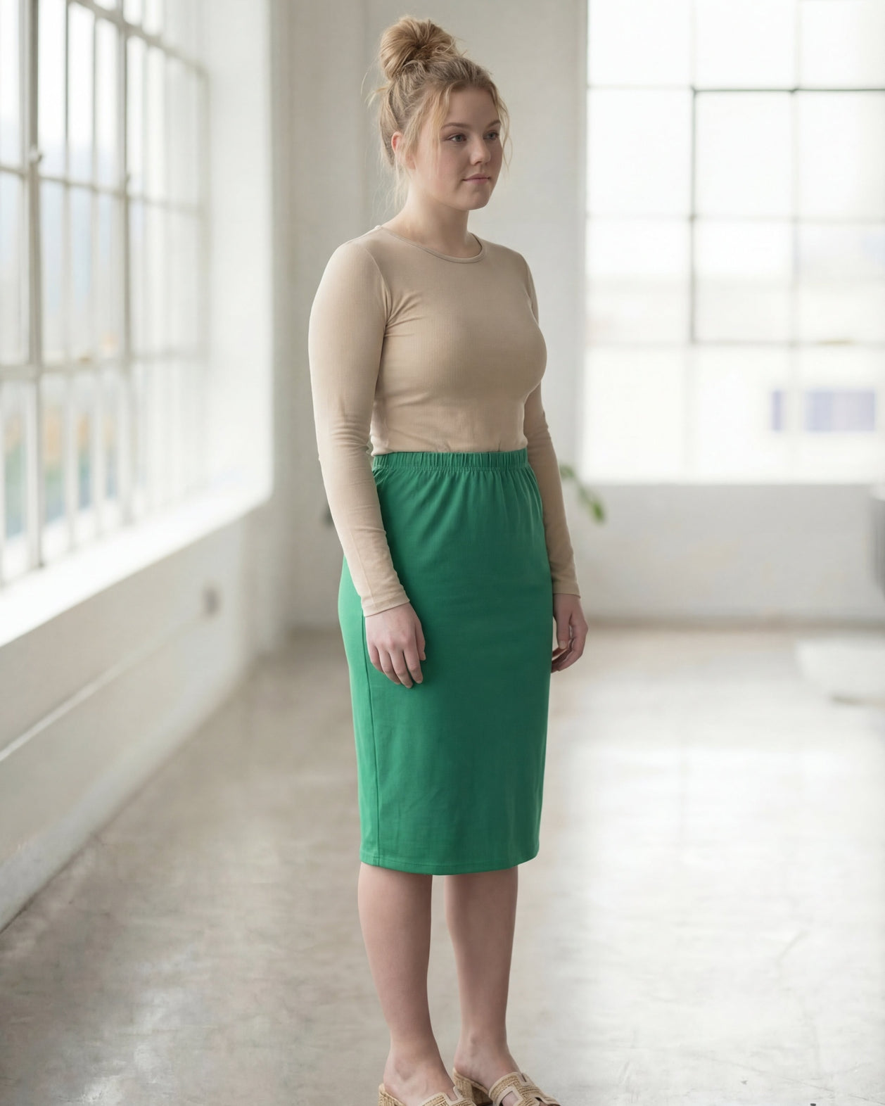 Model wearing Nuggles® 27" Classic Skirt in Kelly Green