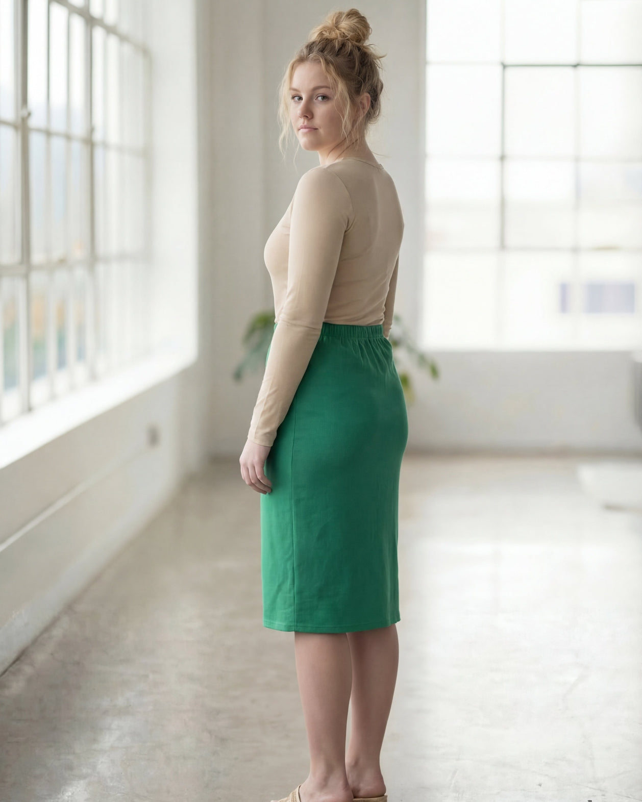 Model wearing Nuggles® 27" Classic Skirt in Kelly Green