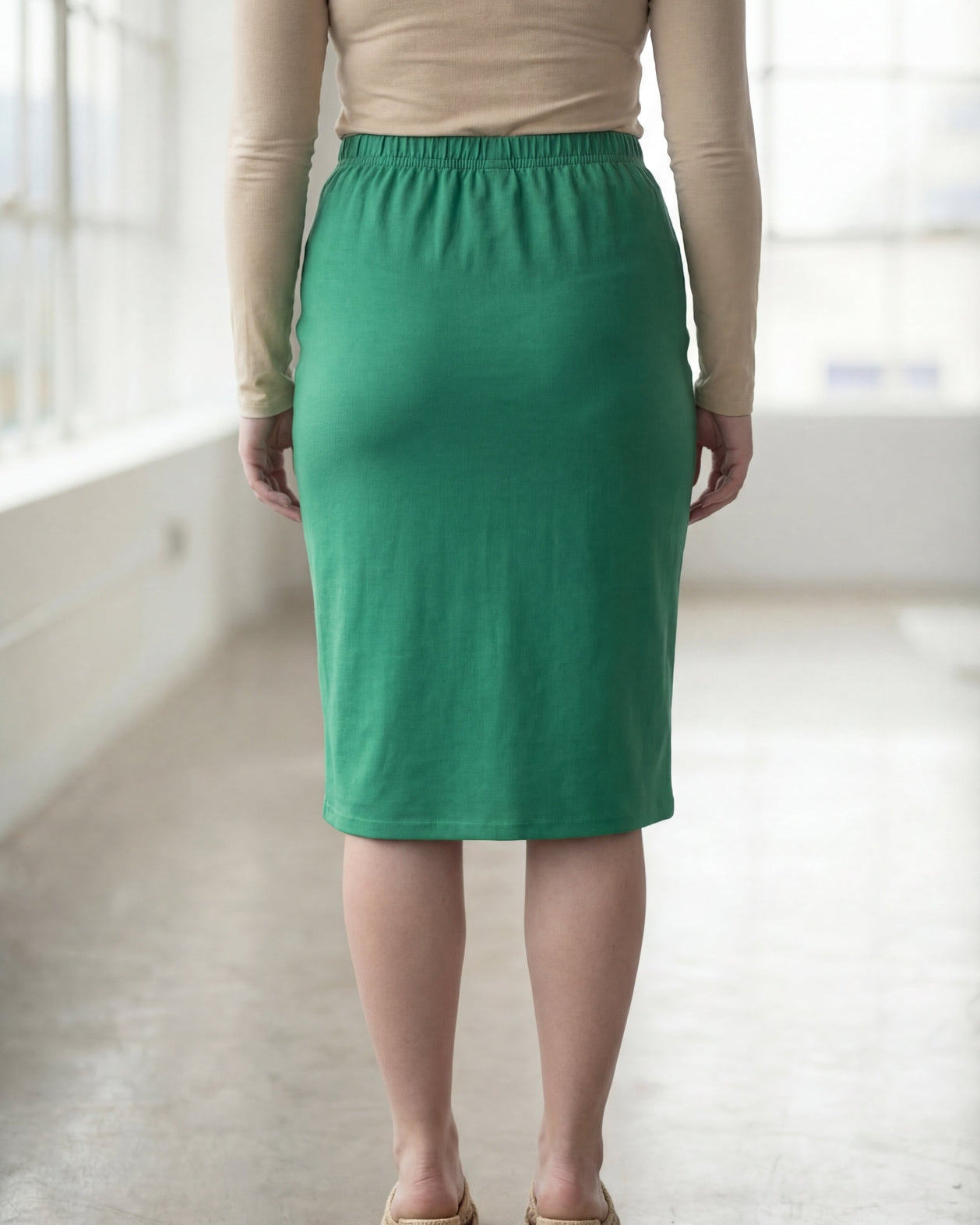 Model wearing Nuggles® 27" Classic Skirt in Kelly Green