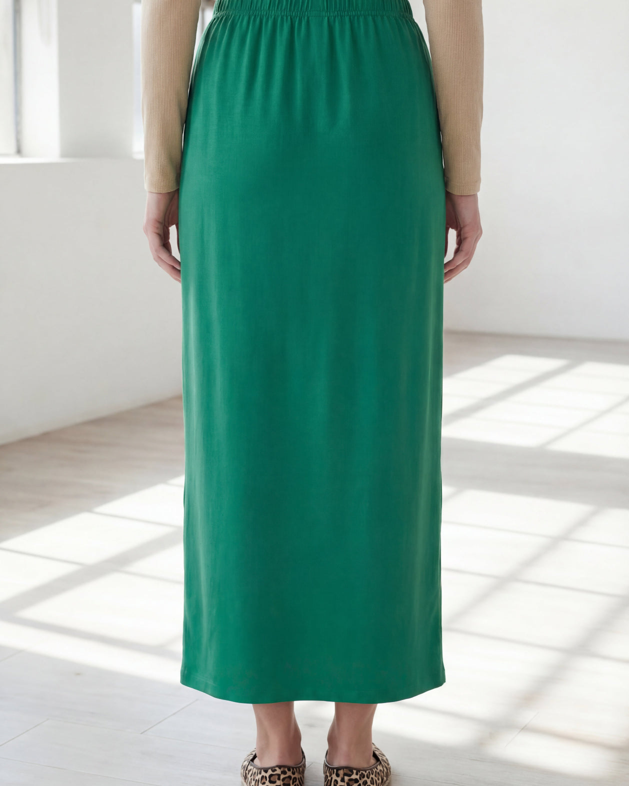 Model wearing Nuggles® 36" Classic Skirt in Kelly Green