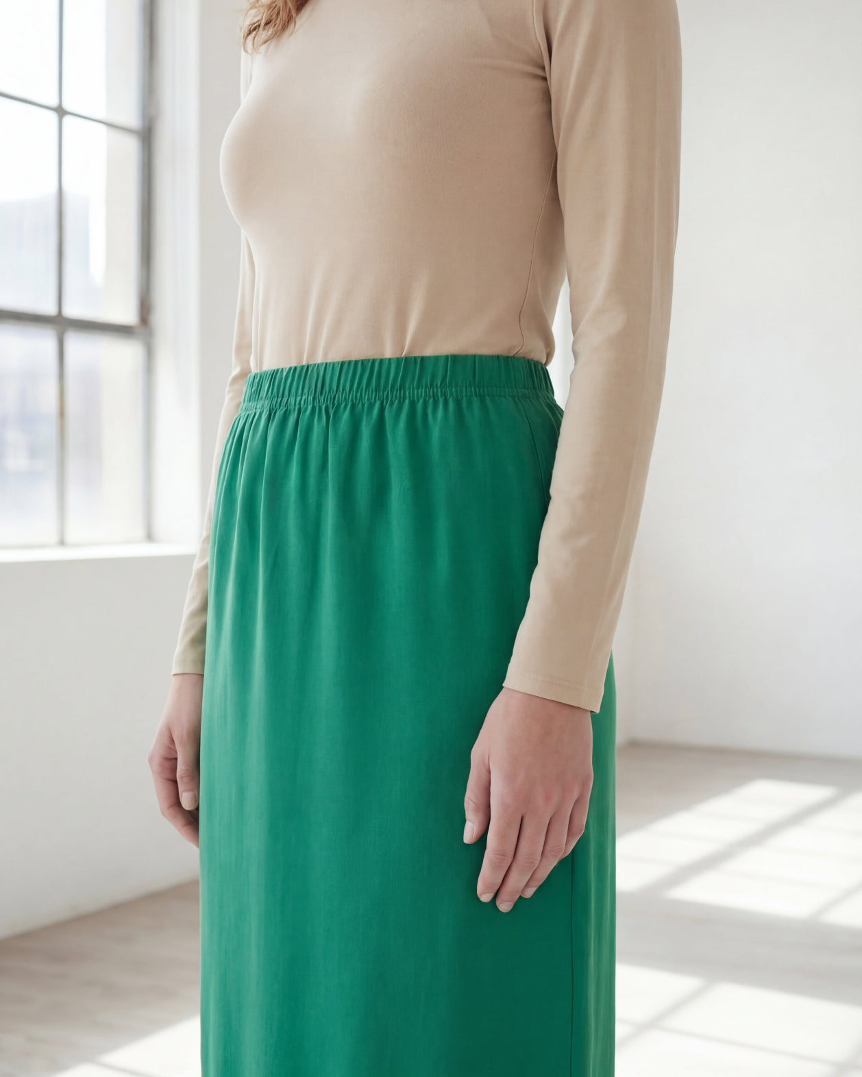 Model wearing Nuggles® 36" Classic Skirt in Kelly Green