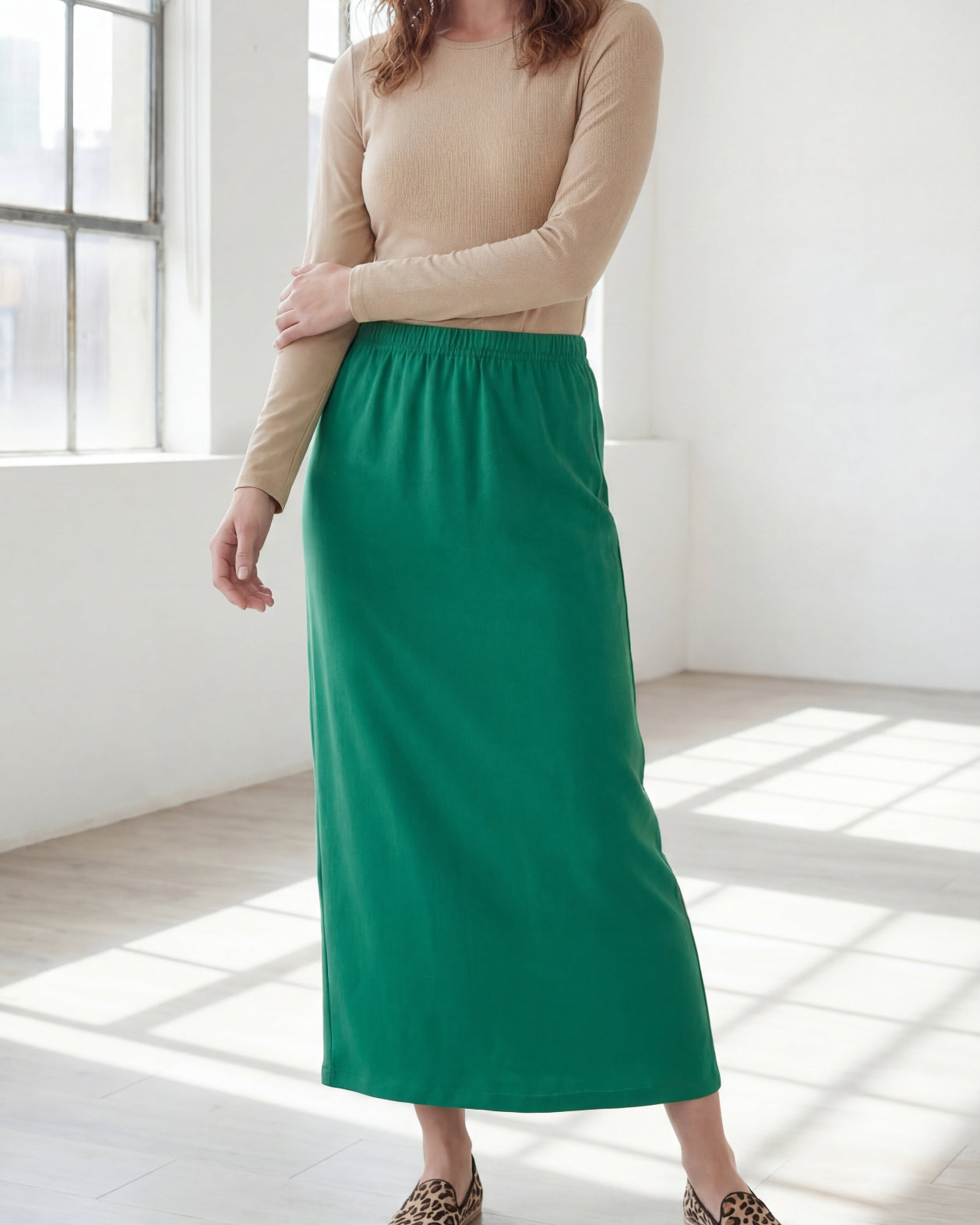Model wearing Nuggles® 36" Classic Skirt in Kelly Green