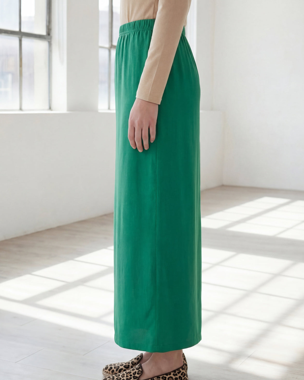 Model wearing Nuggles® 36" Classic Skirt in Kelly Green