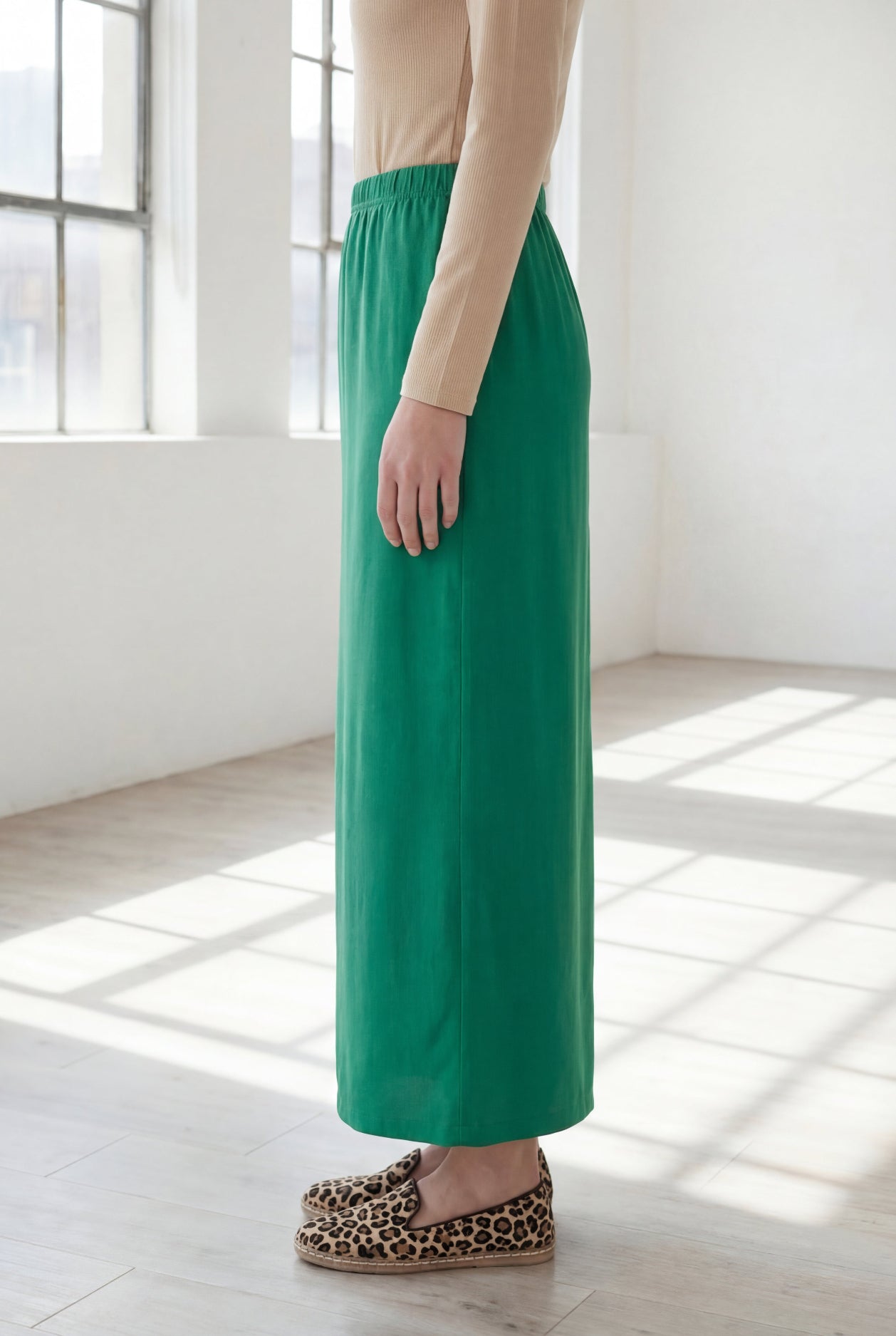 Model wearing Nuggles® 36" Classic Skirt in Kelly Green