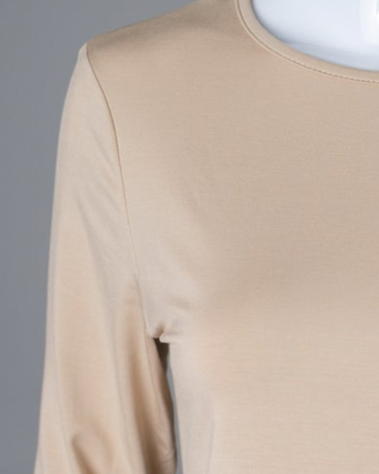 Model wearing Nuggles® 3/4 Essential Tee in Khaki