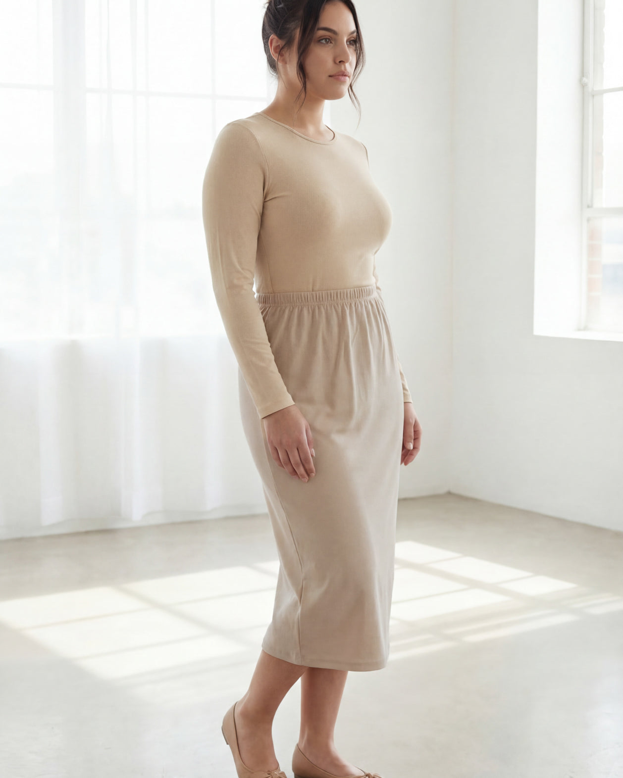 Model wearing Nuggles® 31" Classic Skirt in Khaki