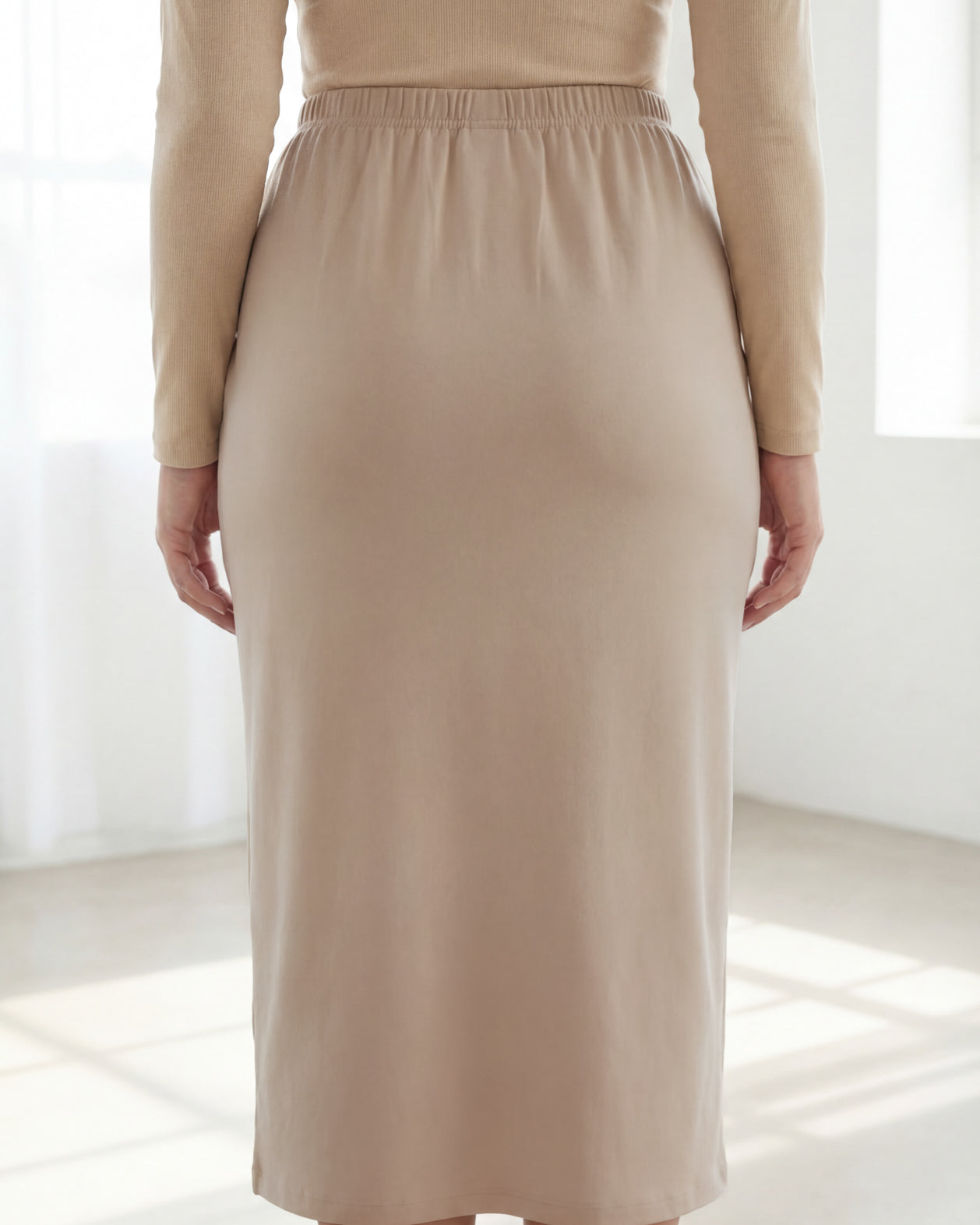 Model wearing Nuggles® 31" Classic Skirt in Khaki