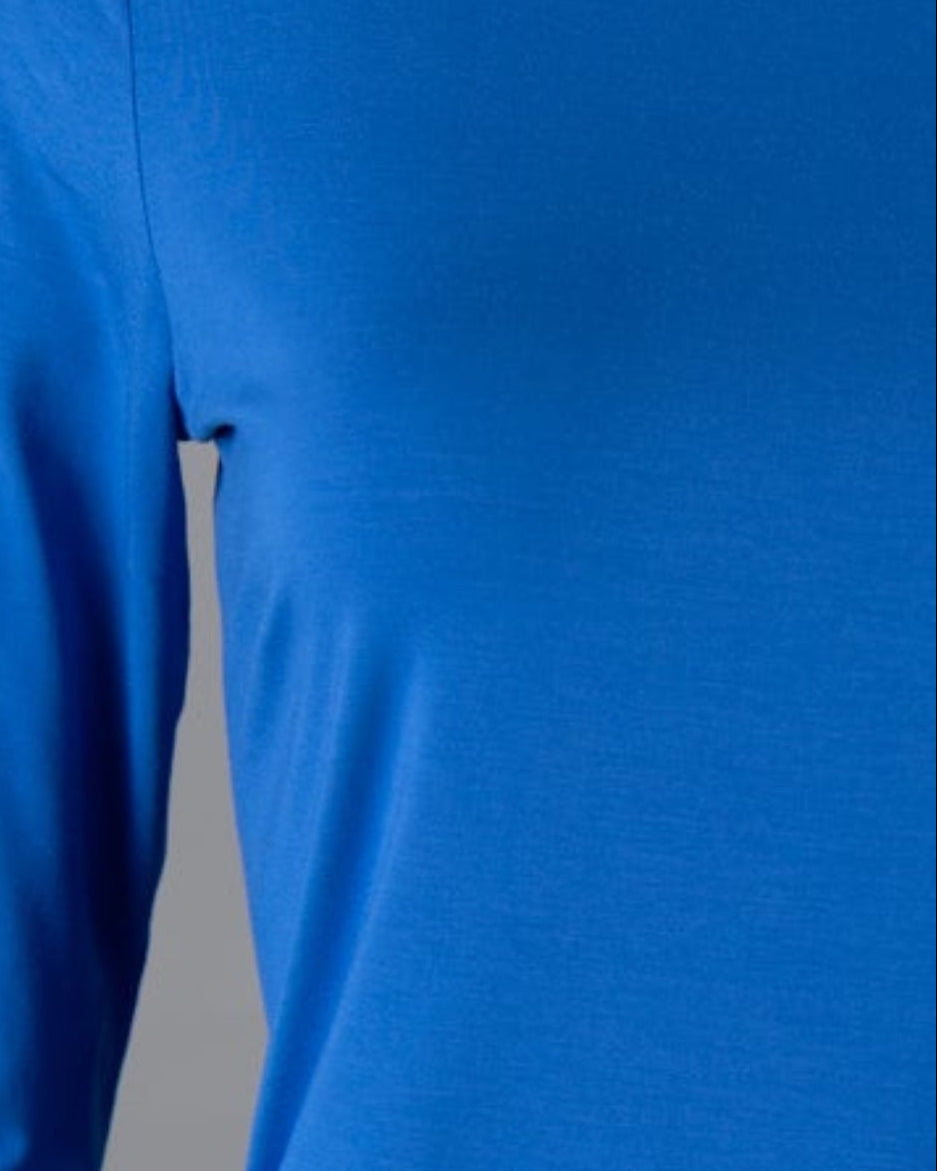 Model wearing Nuggles® 3/4 Essential Tee in Lapiz Blue