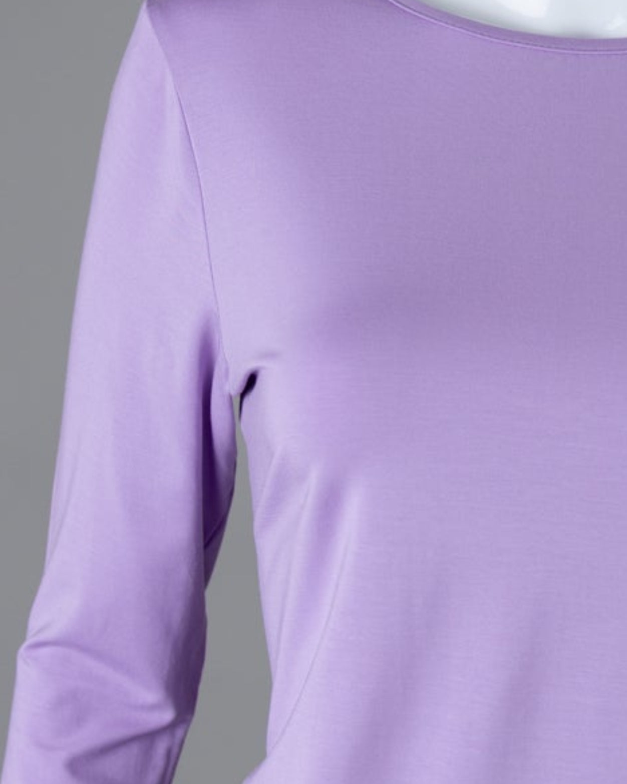 Model wearing Nuggles® 3/4 Essential Tee in Lavender