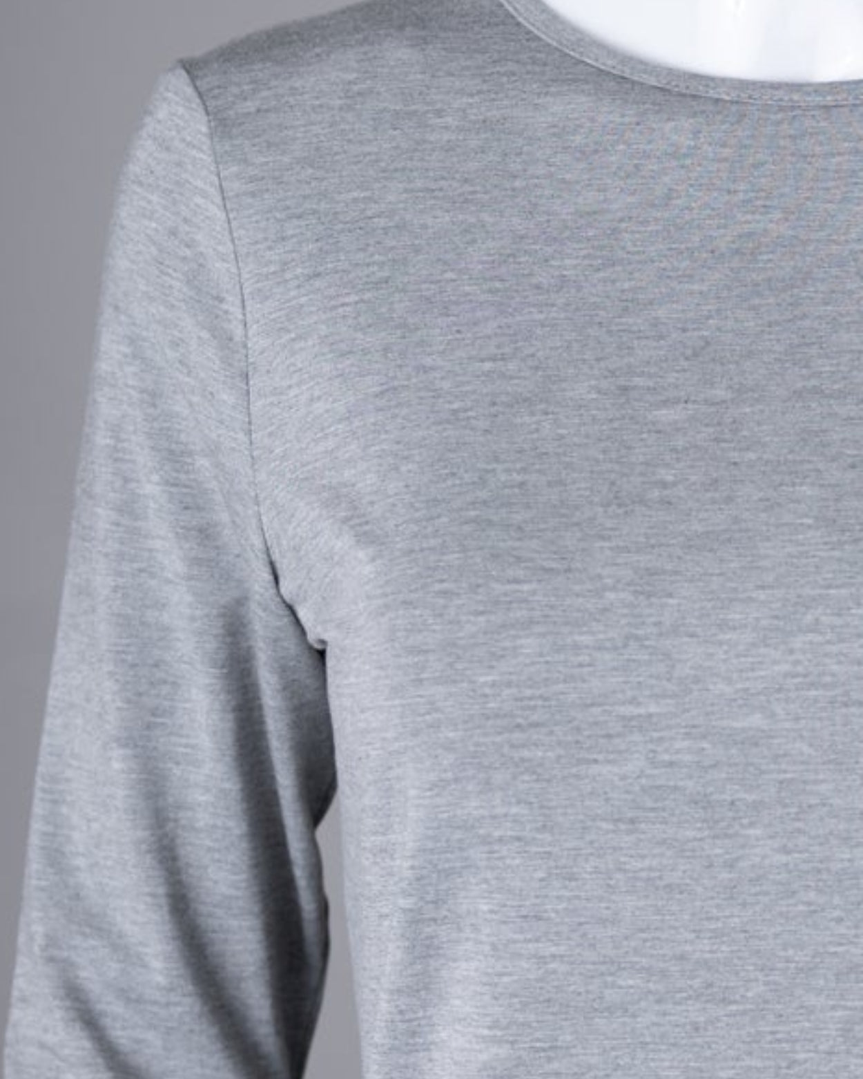 Model wearing Nuggles® 3/4 Essential Tee in Light Heather
