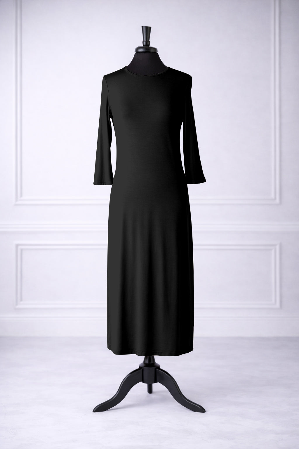 Front view of Nuggles® original midi layering dress in Black