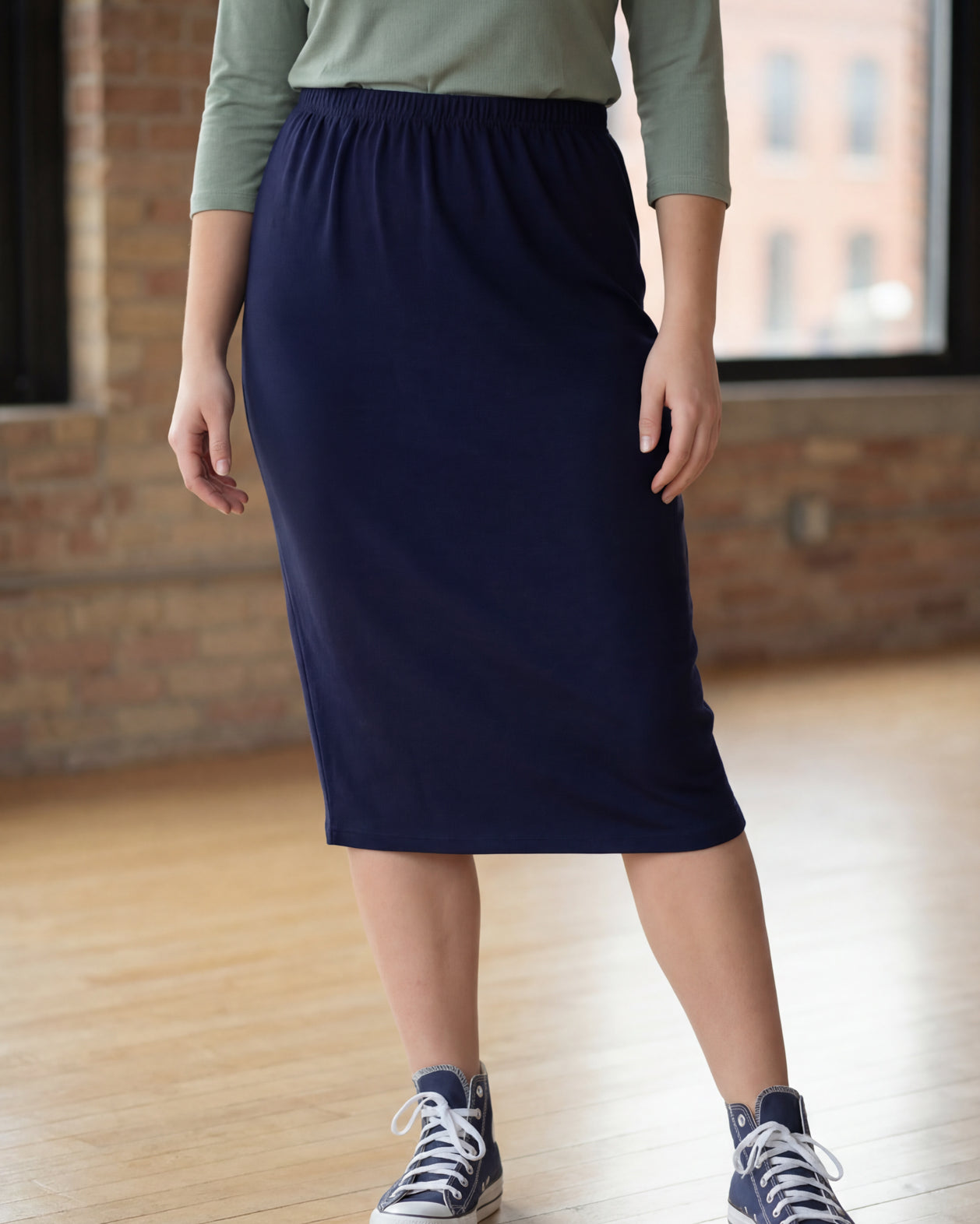Model wearing Nuggles® 27" Classic Skirt in Navy