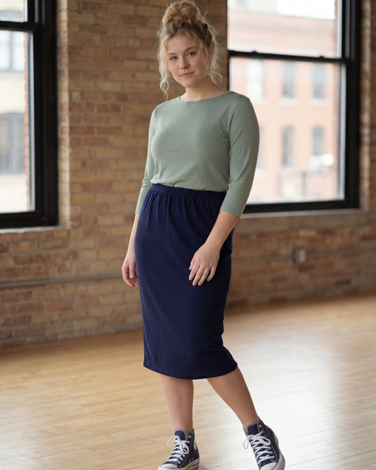 Model wearing Nuggles® 27" Classic Skirt in Navy