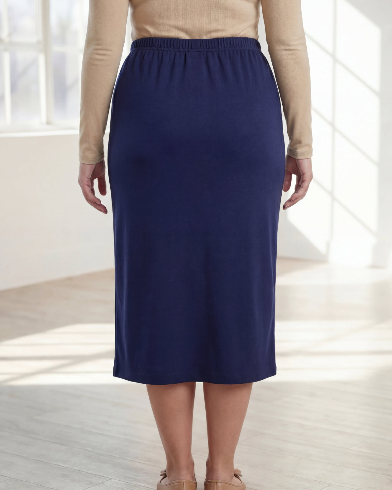 Model wearing Nuggles® 31" Classic Skirt in Navy