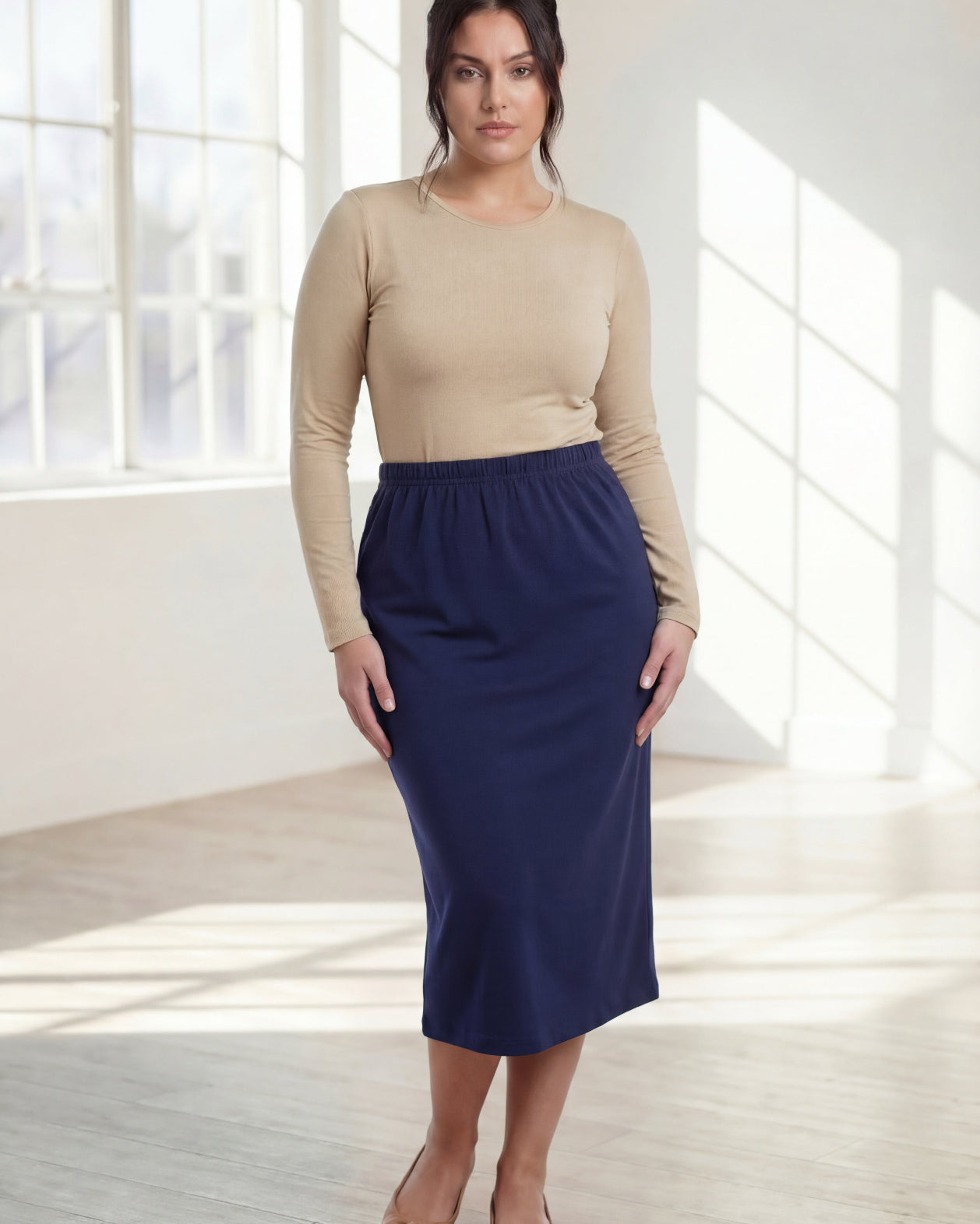 Model wearing Nuggles® 31" Classic Skirt in Navy