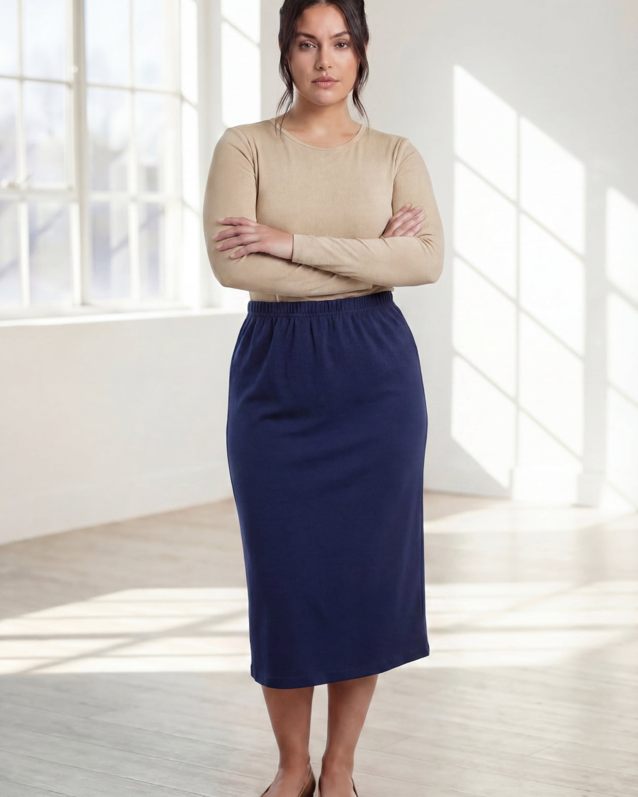 Model wearing Nuggles® 31" Classic Skirt in Navy