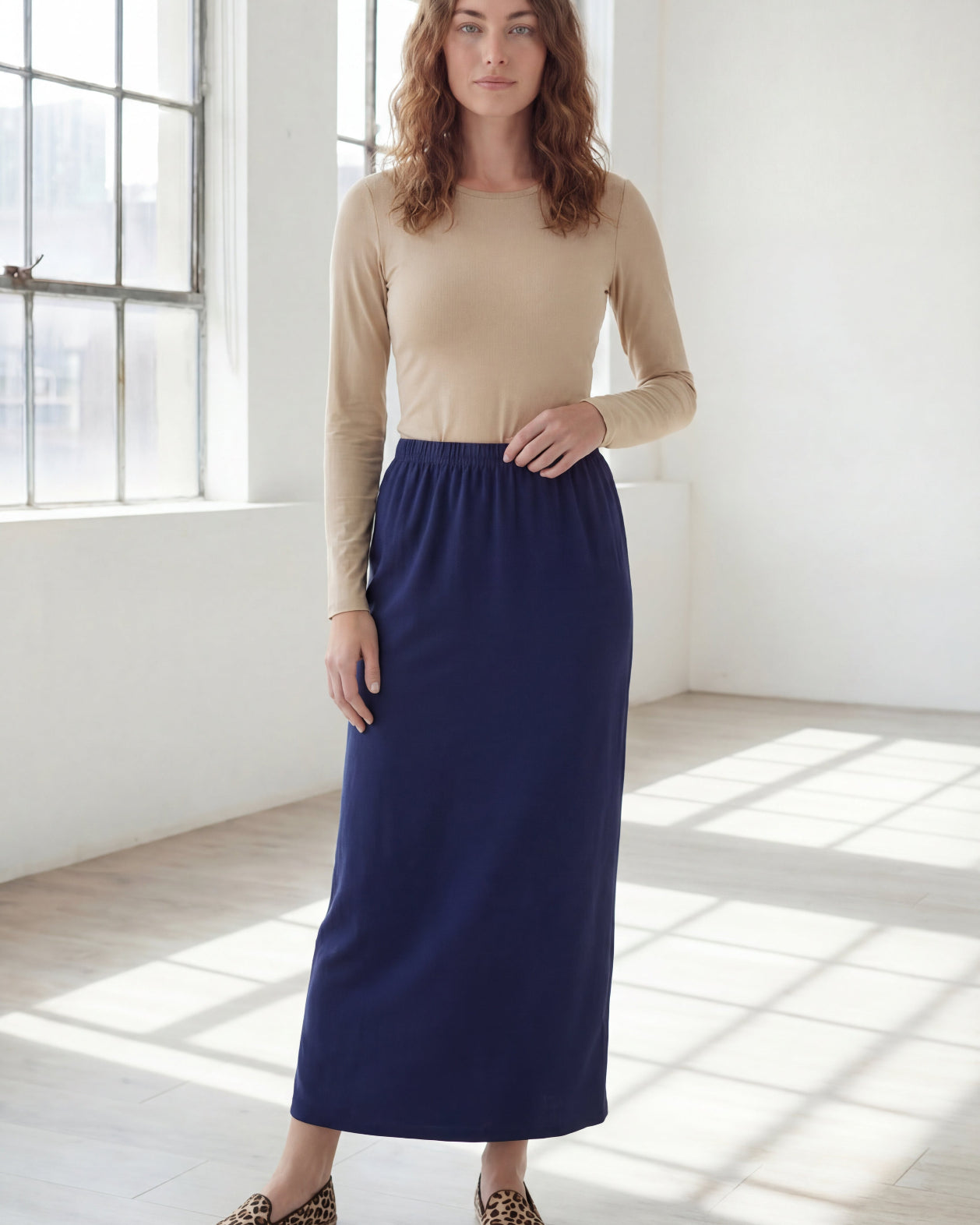 Model wearing Nuggles® 36" Classic Skirt in Navy