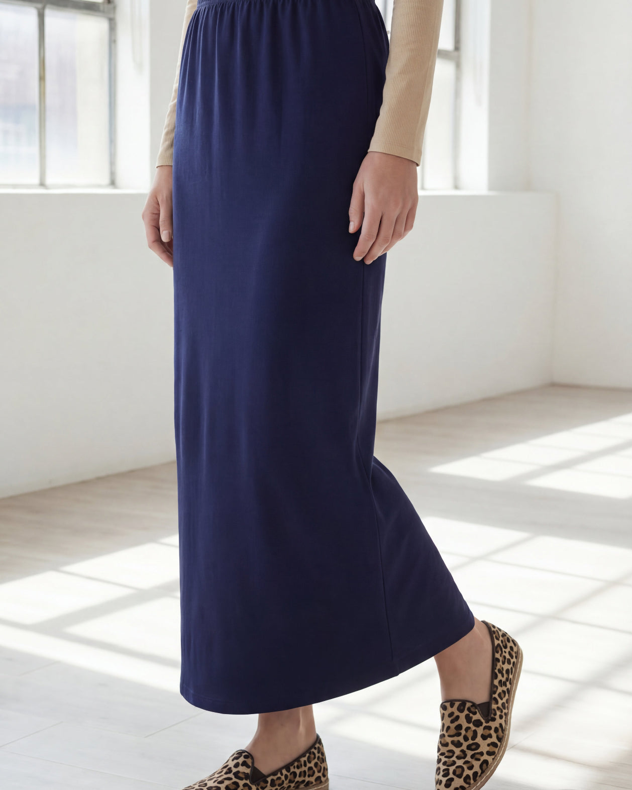 Model wearing Nuggles® 36" Classic Skirt in Navy