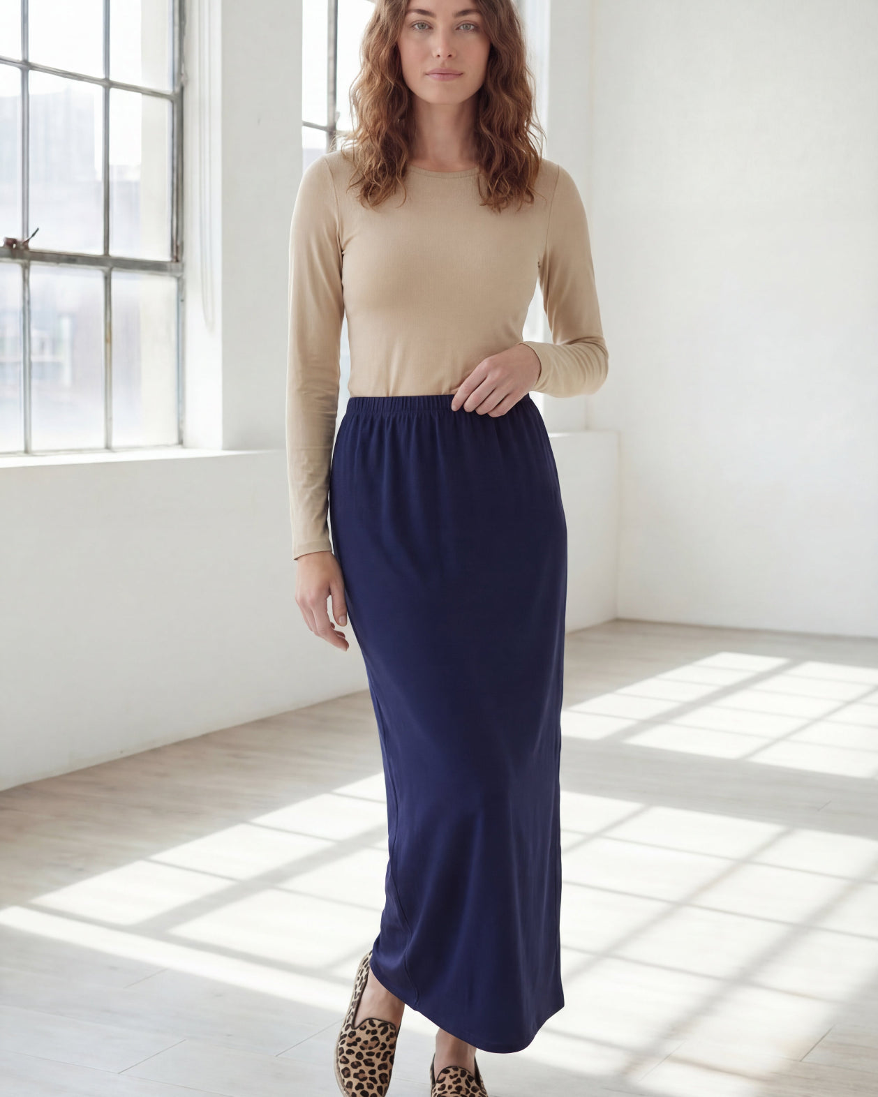 Model wearing Nuggles® 36" Classic Skirt in Navy