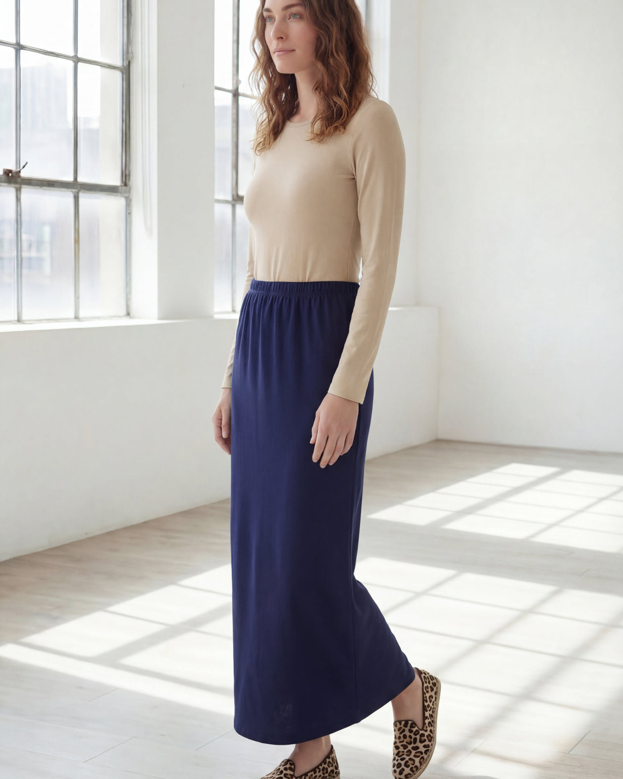 Model wearing Nuggles® 36" Classic Skirt in Navy