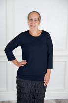 Relaxed Essential Tee styled with a modest skirt