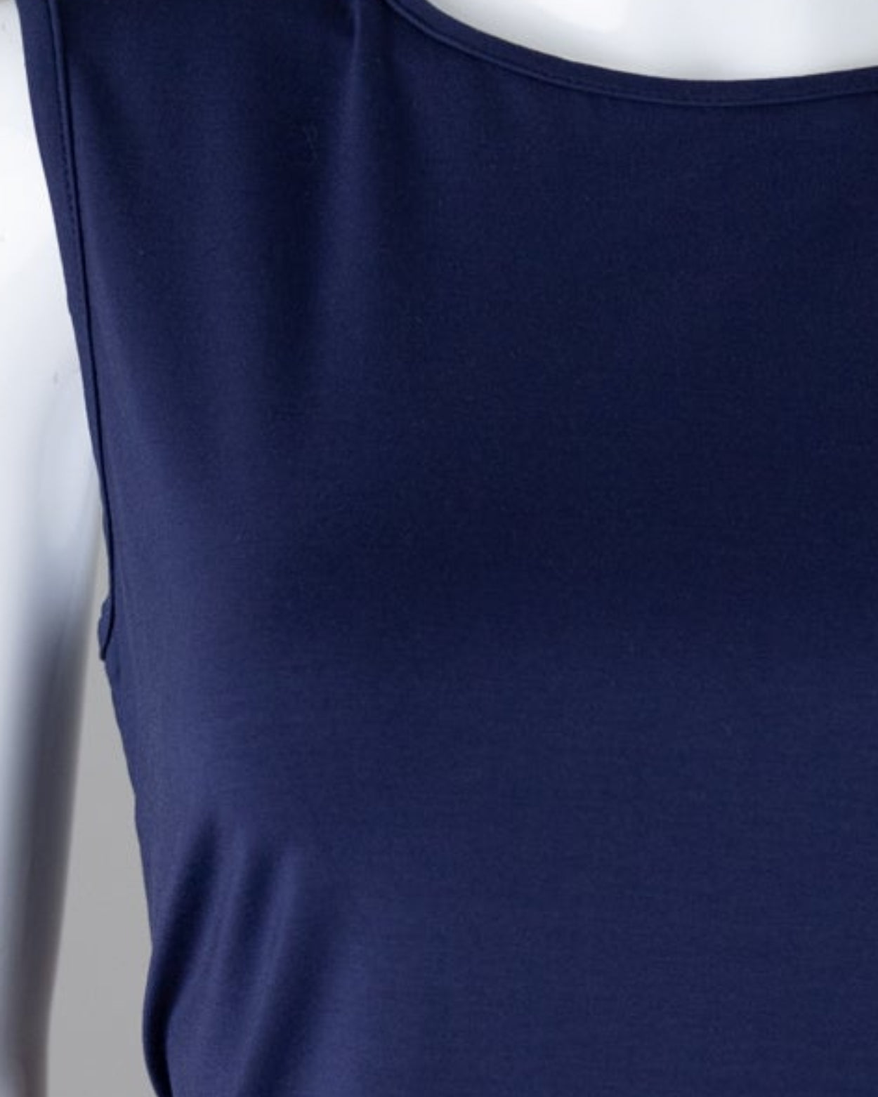 Model wearing Nuggles® Essential Tank in Navy