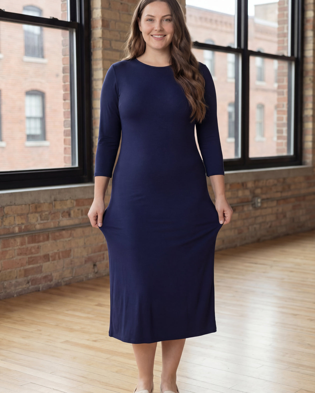 Model wearing Nuggles® Midi Layering Dress in Navy