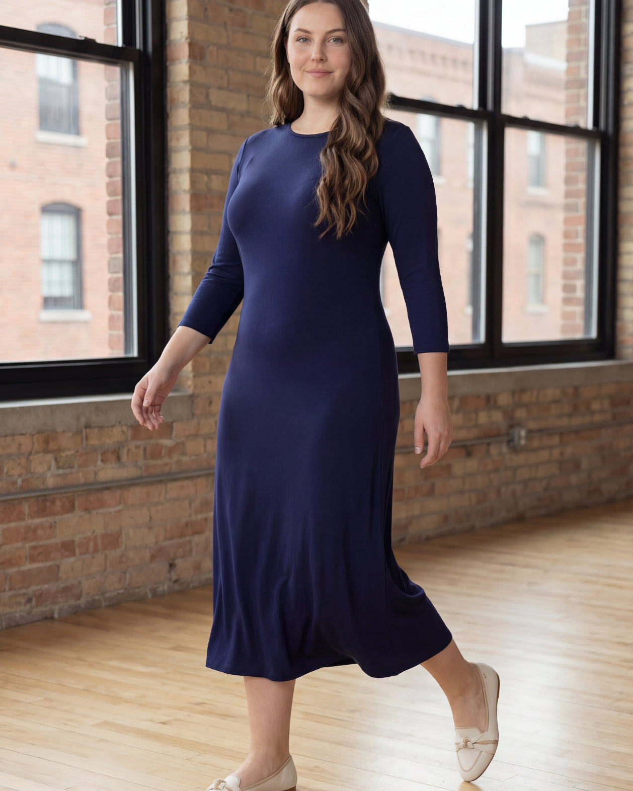 Model wearing Nuggles® Midi Layering Dress in Navy