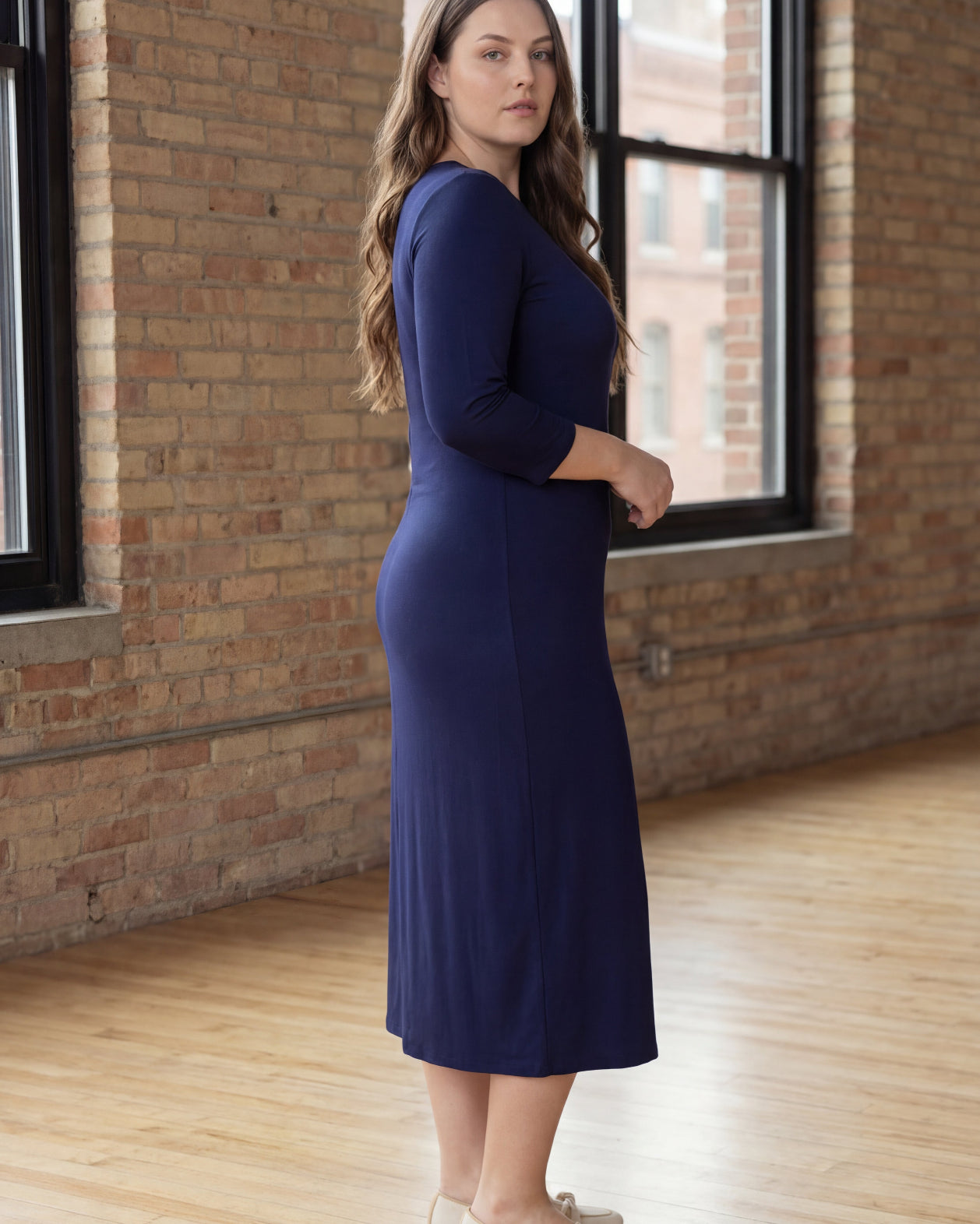 Model wearing Nuggles® Midi Layering Dress in Navy