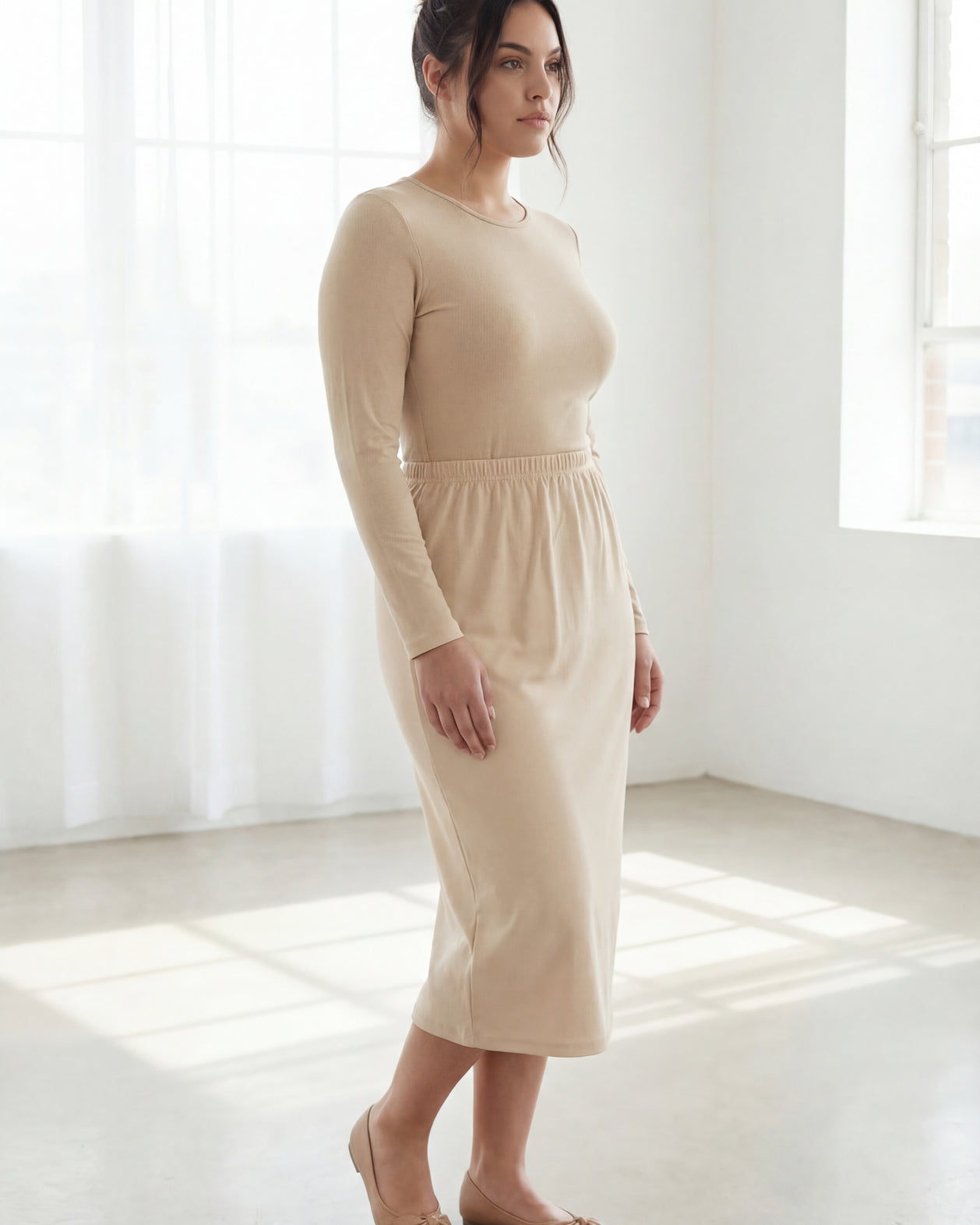 Model wearing Nuggles® 31" Classic Skirt in Nude