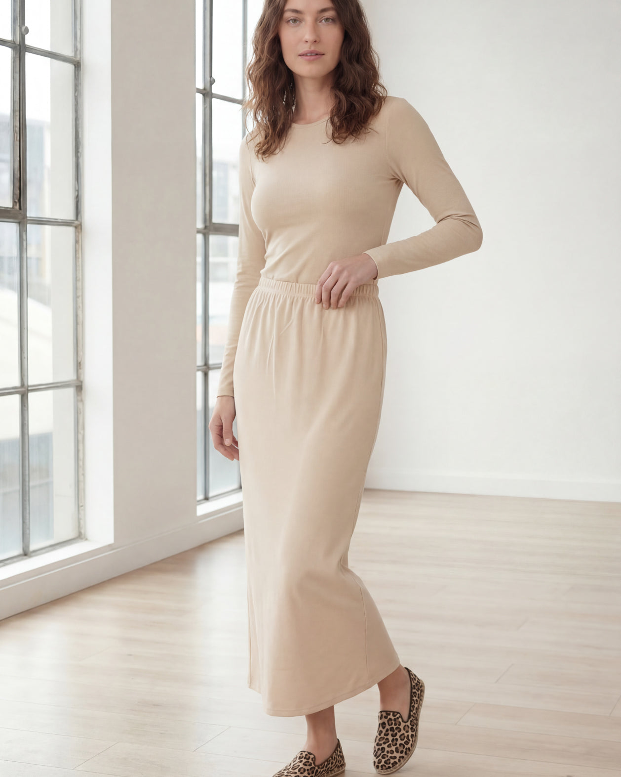 Model wearing Nuggles® 36" Classic Skirt in Nude