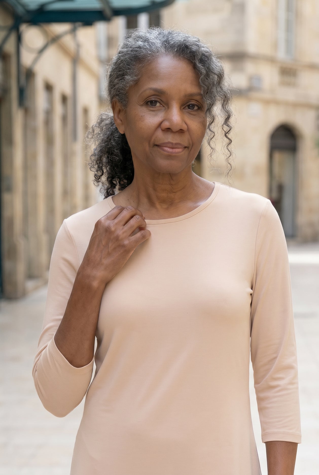 Model wearing Nuggles® Half Sleeve Essential Tee in Nude