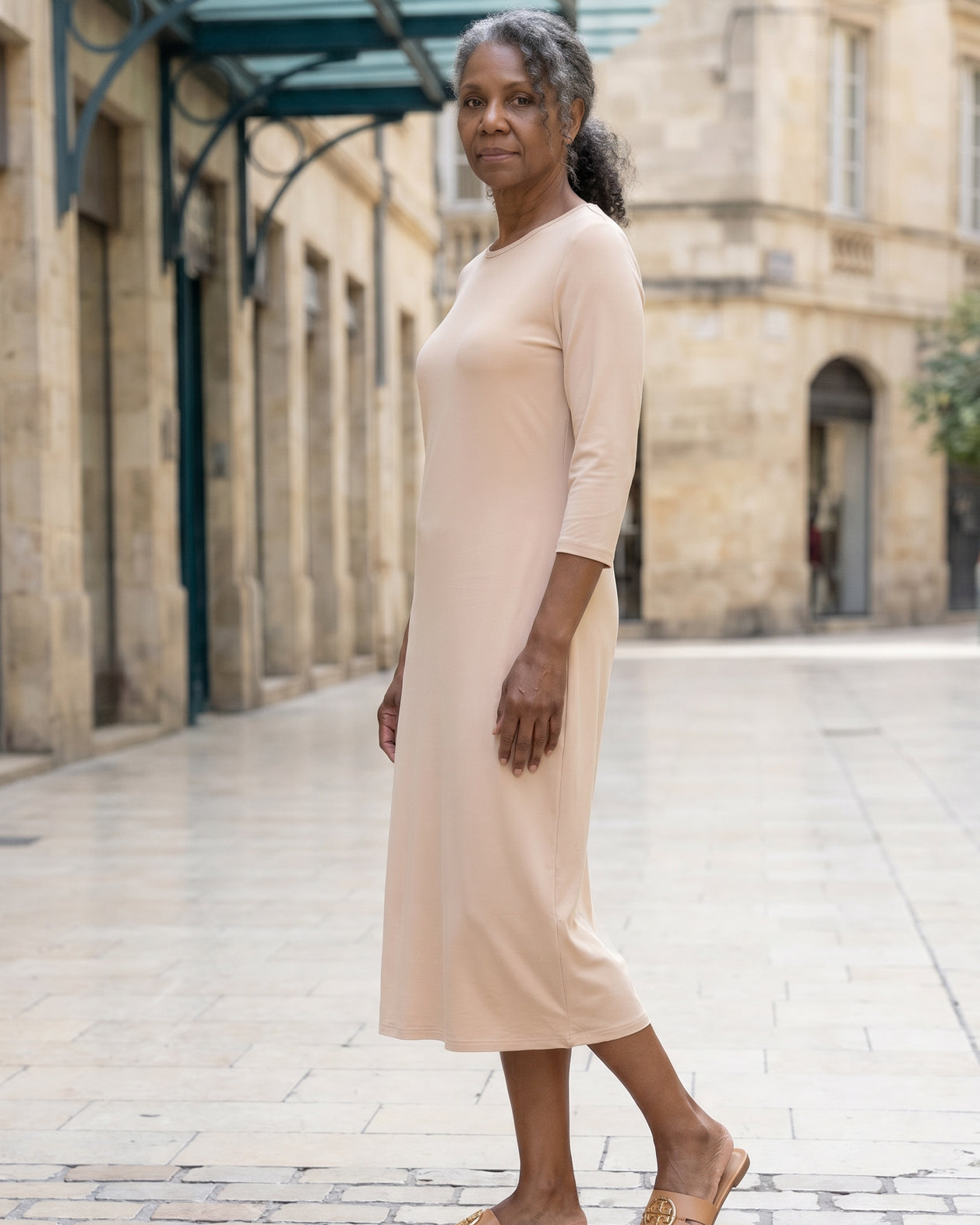 Model wearing Nuggles® Midi Layering Dress in Nude