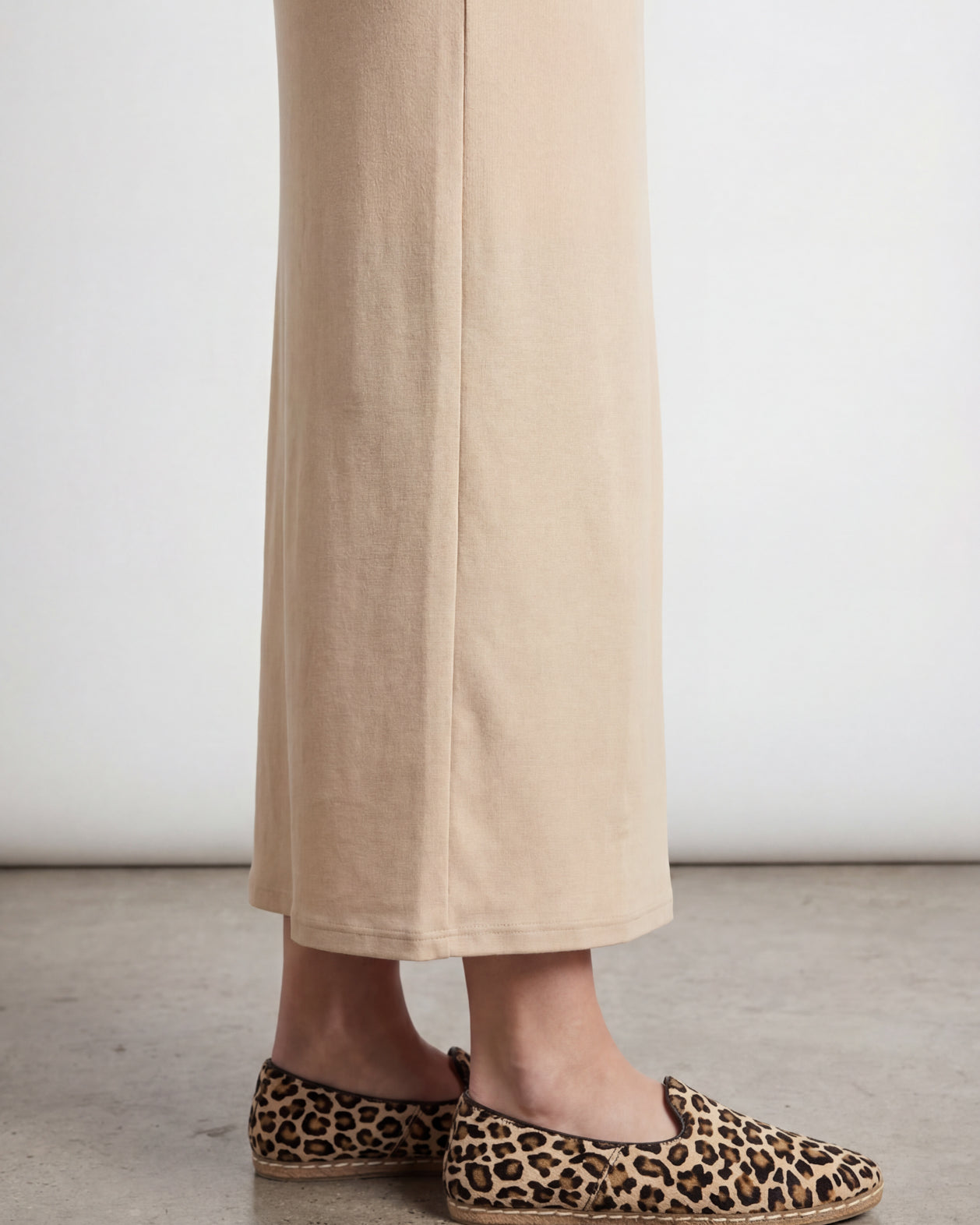 Model wearing Nuggles® 36" Classic Skirt in Nude