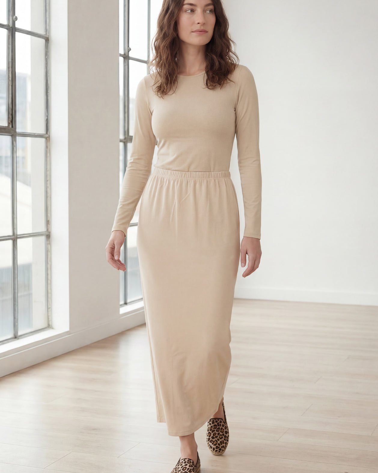 Model wearing Nuggles® 36" Classic Skirt in Nude