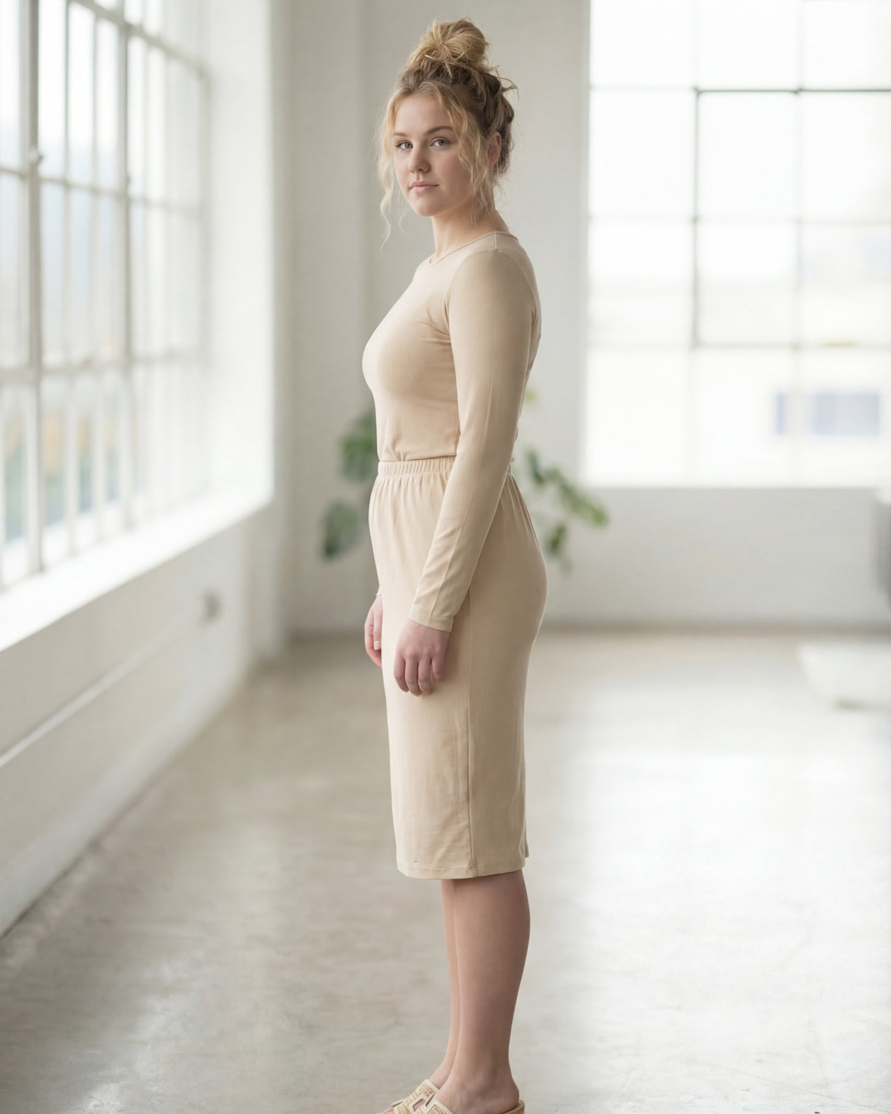 Model wearing Nuggles® 27" Classic Skirt in Nude