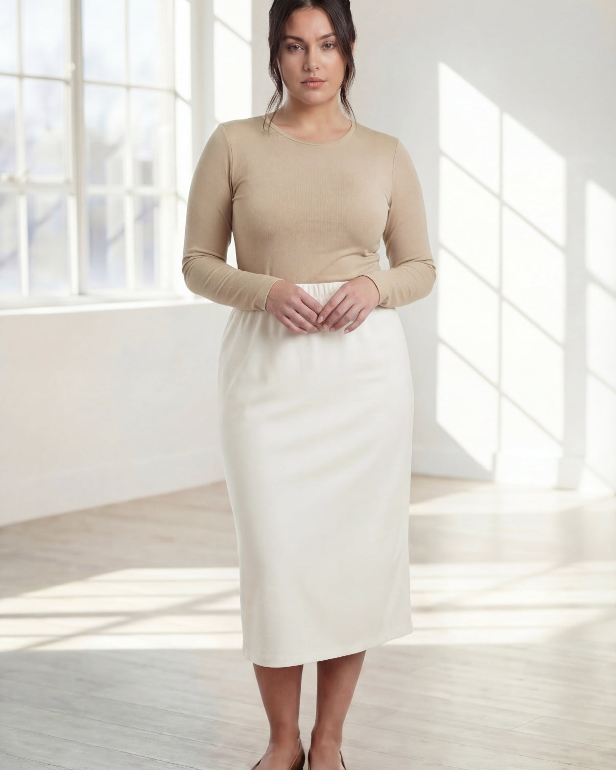 Model wearing Nuggles® 31" Classic Skirt in Off White