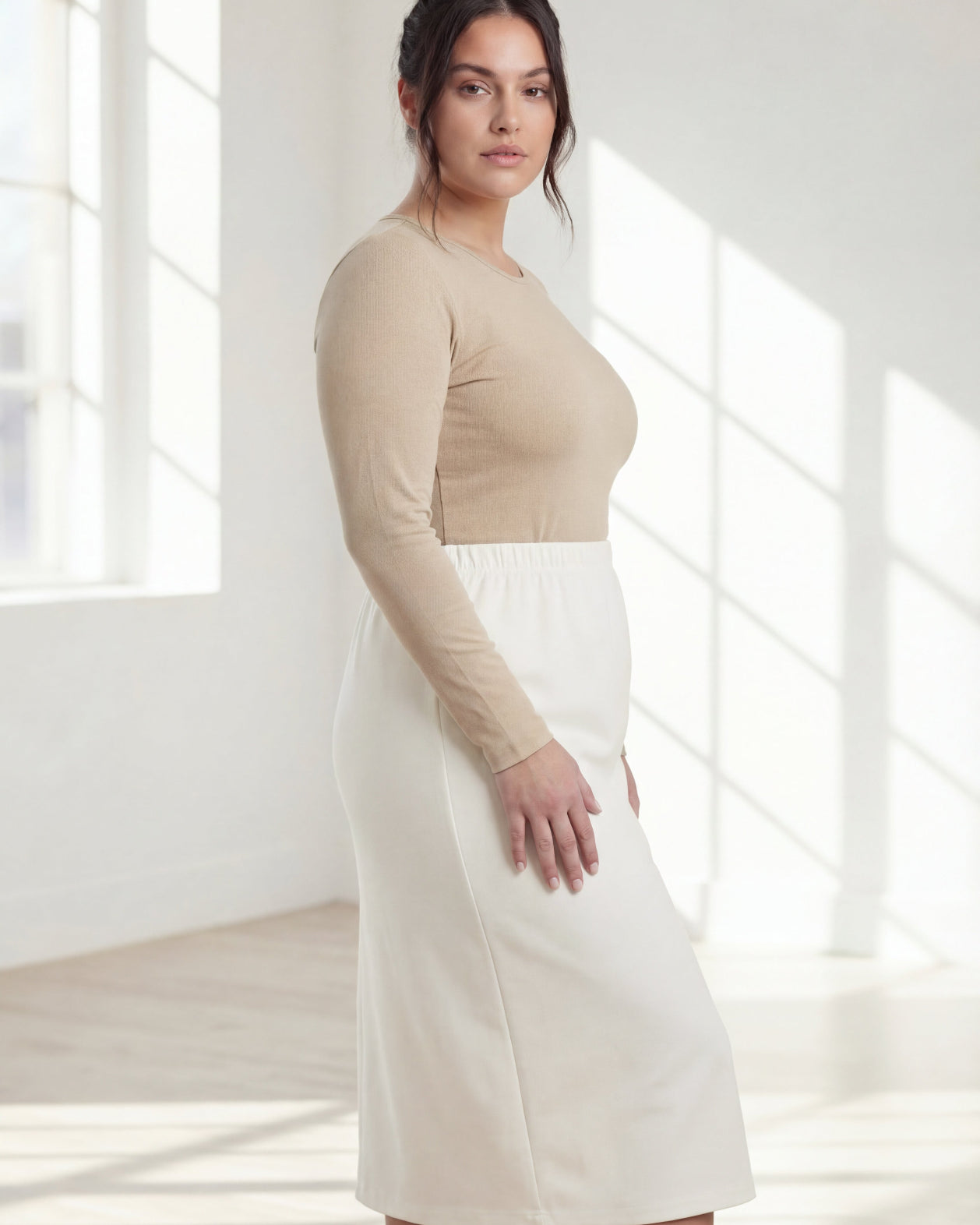 Model wearing Nuggles® 31" Classic Skirt in Off White