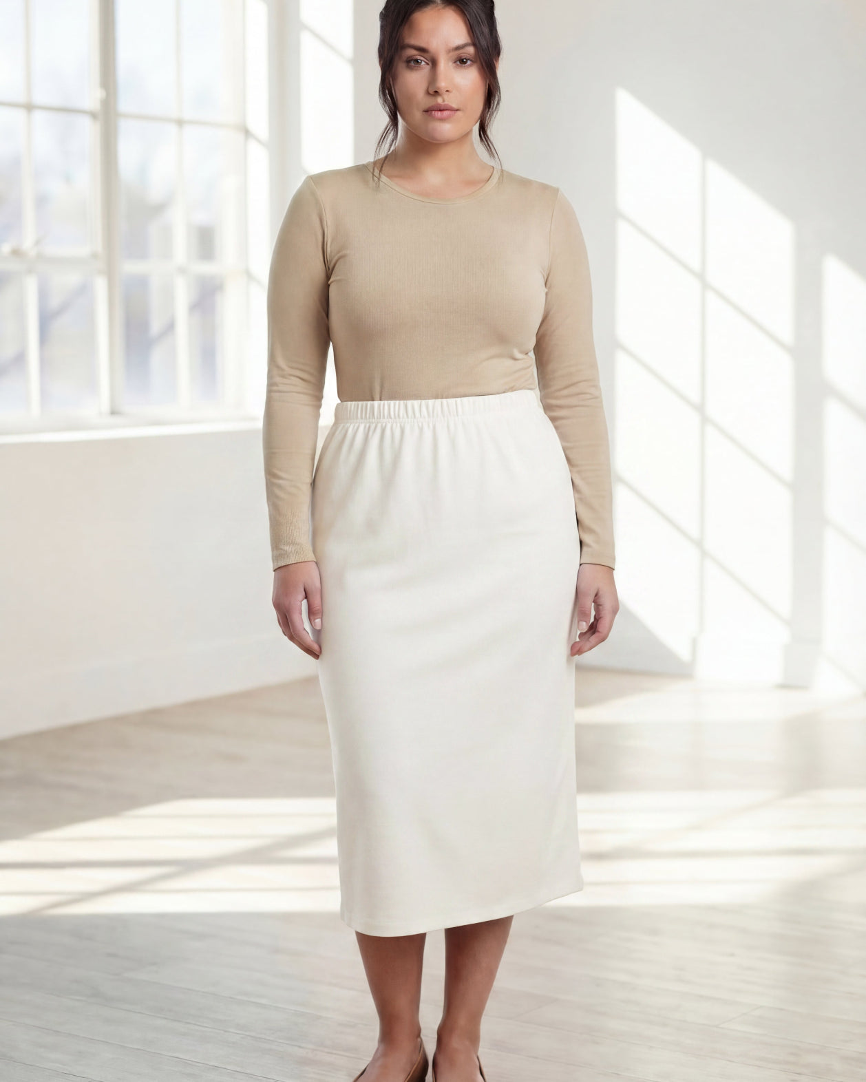 Model wearing Nuggles® 31" Classic Skirt in Off White