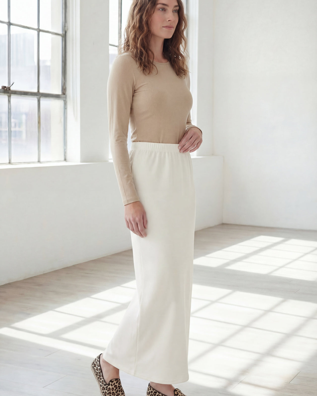 Model wearing Nuggles® 36" Classic Skirt in Off White