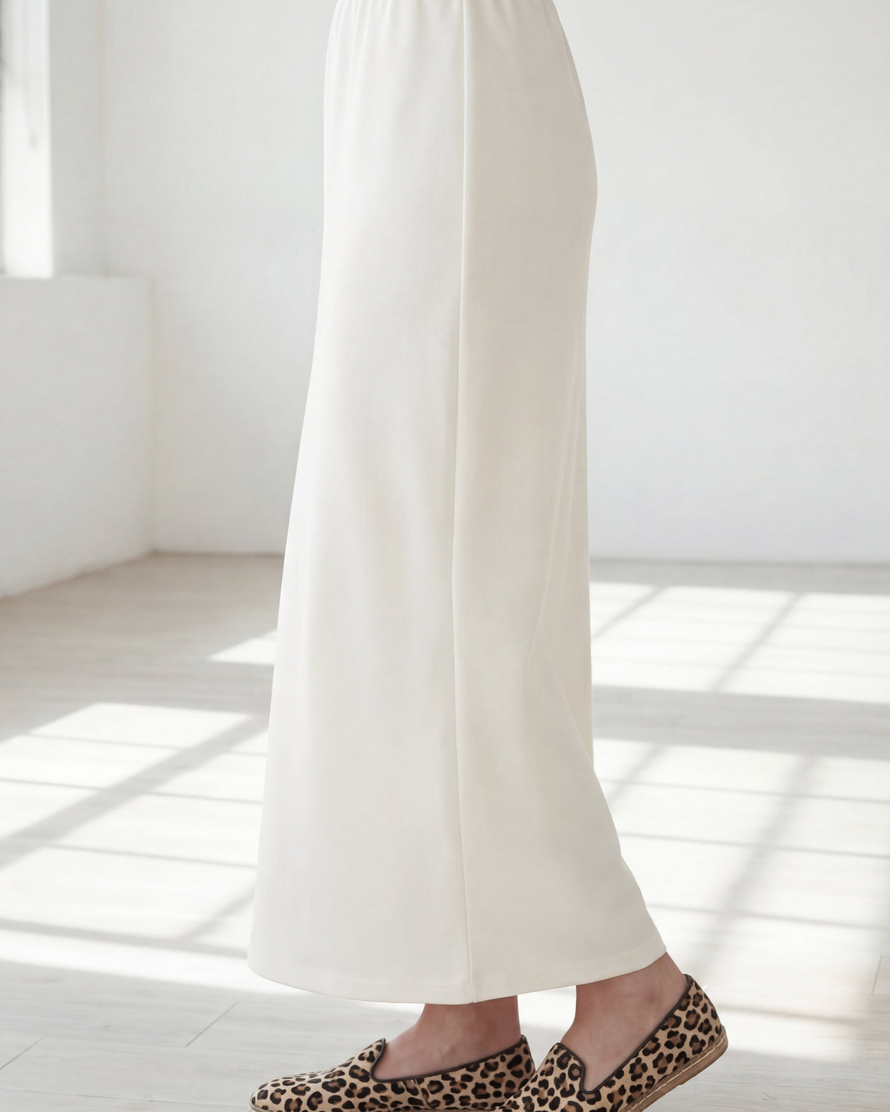 Model wearing Nuggles® 36" Classic Skirt in Off White