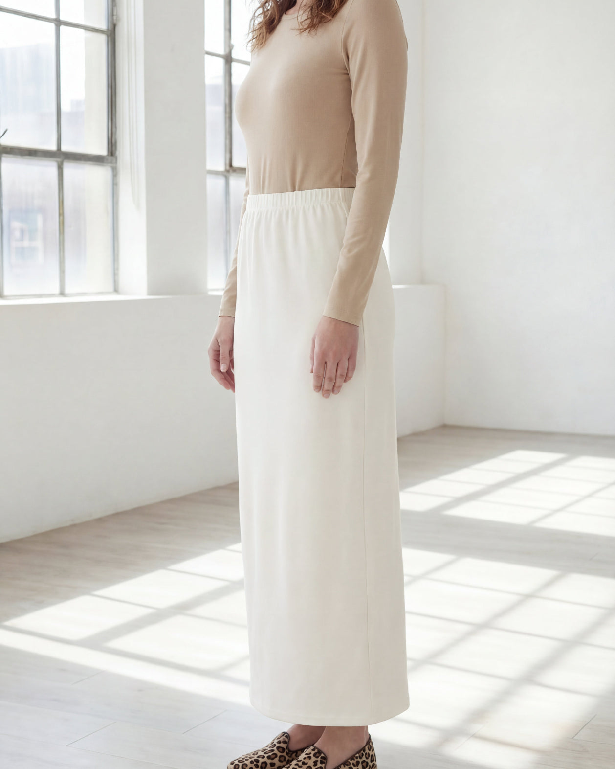 Model wearing Nuggles® 36" Classic Skirt in Off White