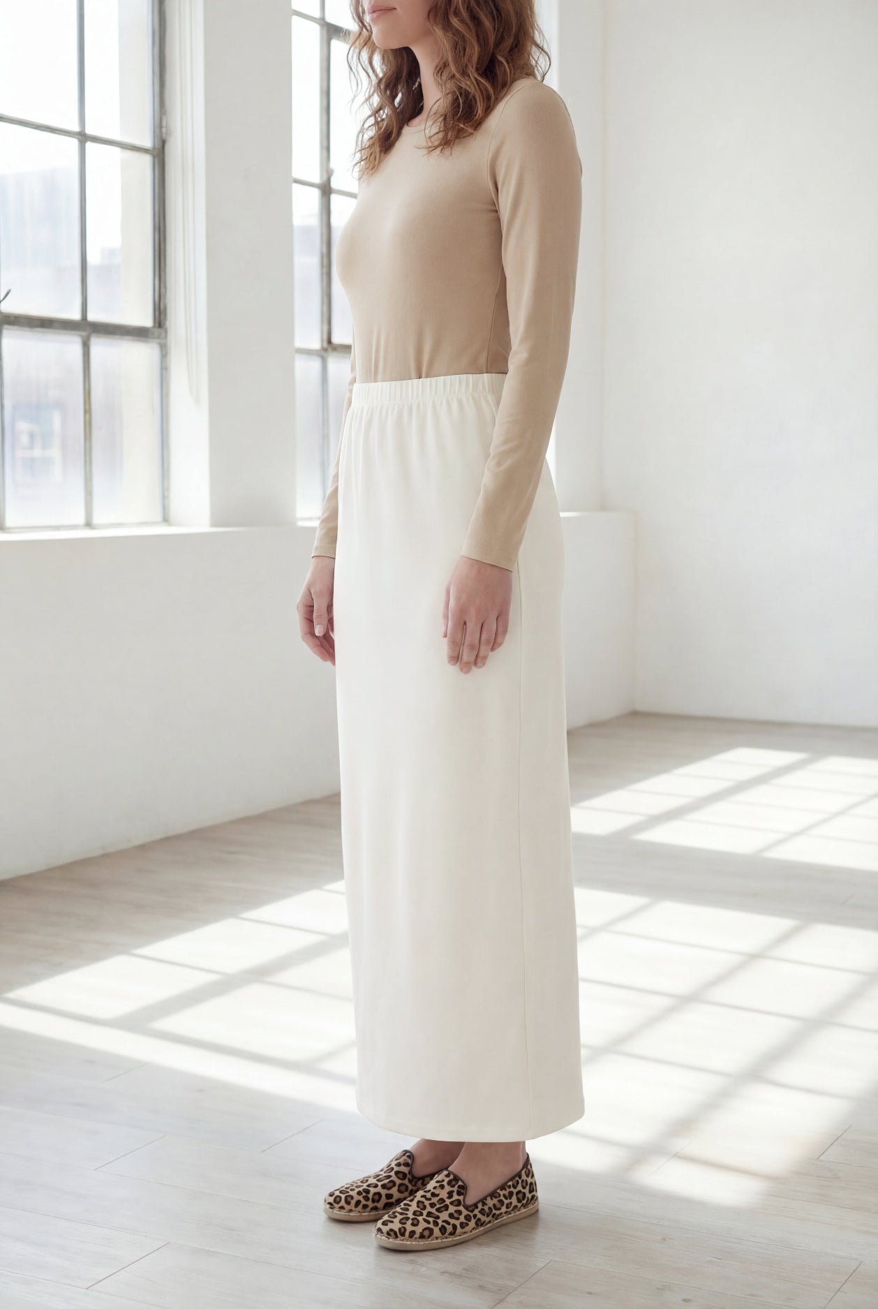 Model wearing Nuggles® 36" Classic Skirt in Off White
