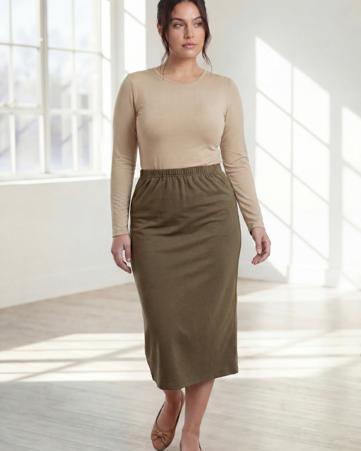 Model wearing Nuggles® 31" Classic Skirt in Olive Brown