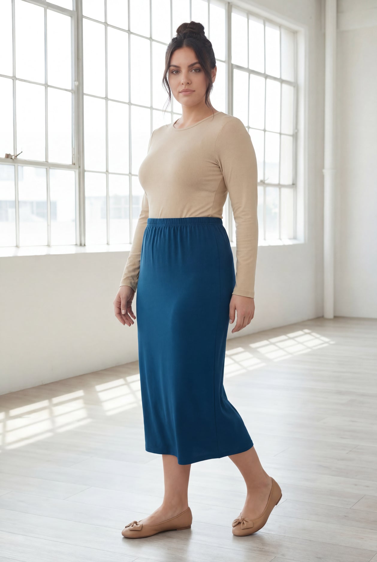 Model wearing Nuggles® 31" Classic Skirt in Peacock Blue