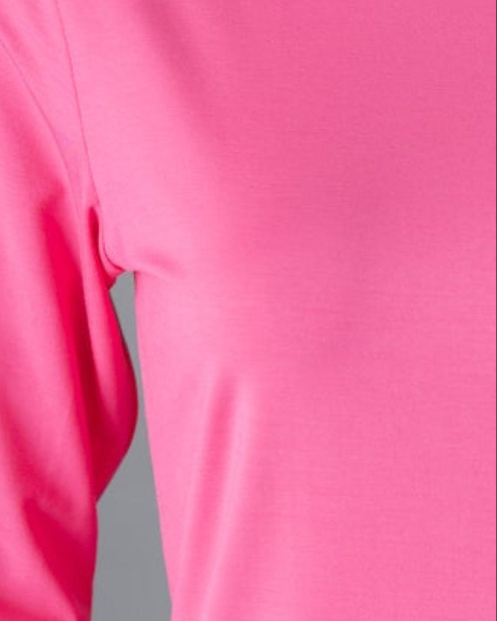 Model wearing Nuggles® 3/4 Essential Tee in Pink