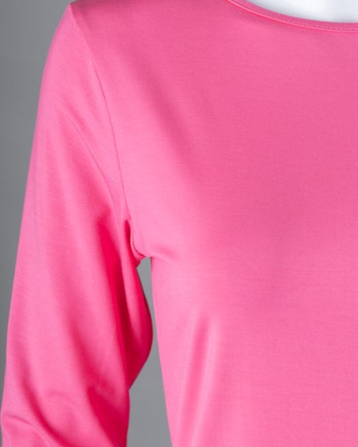 Model wearing Nuggles® 3/4 Essential Tee in Pink