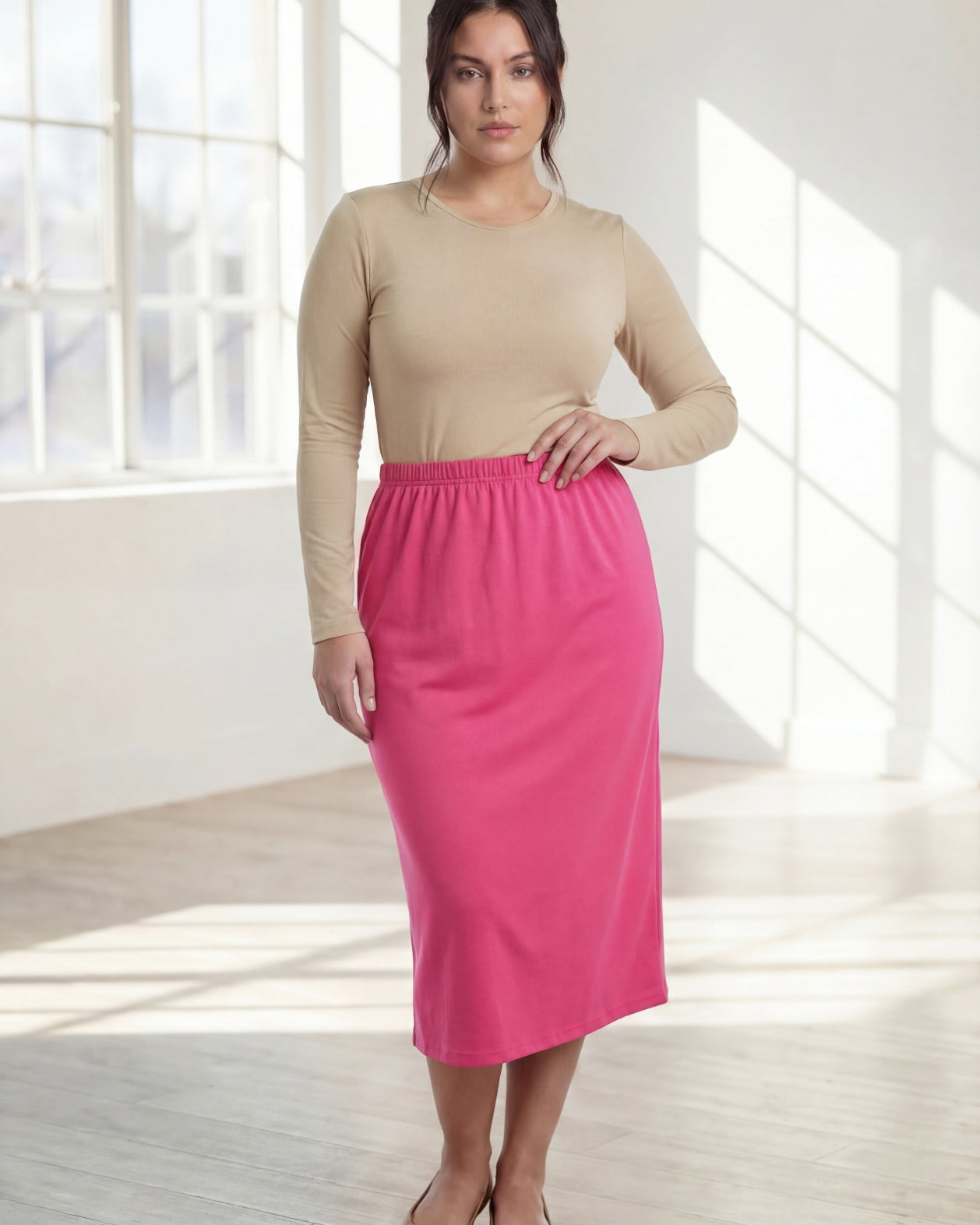Model wearing Nuggles® 31" Classic Skirt in Pink